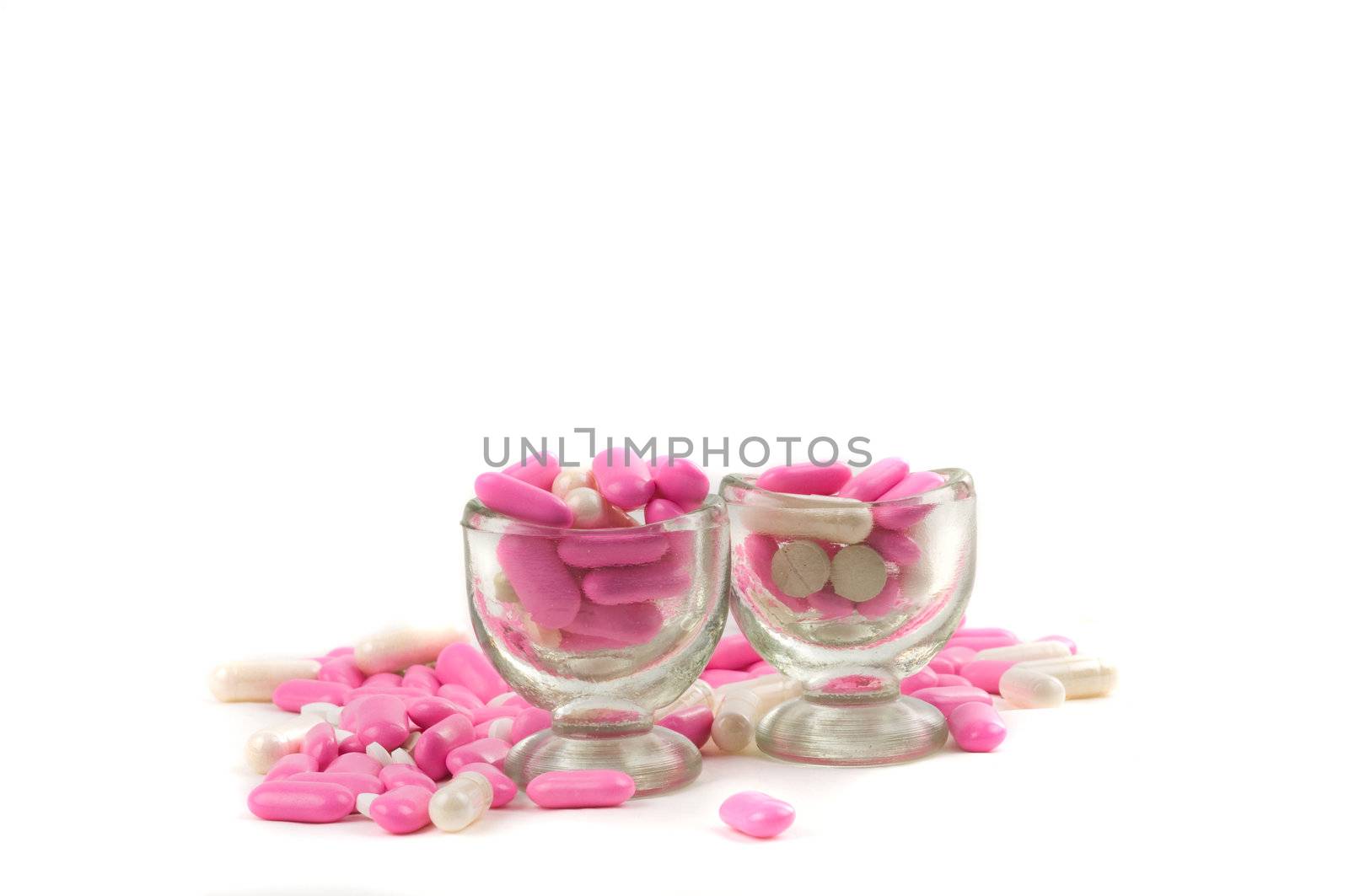 Shot of different pills isolated on white