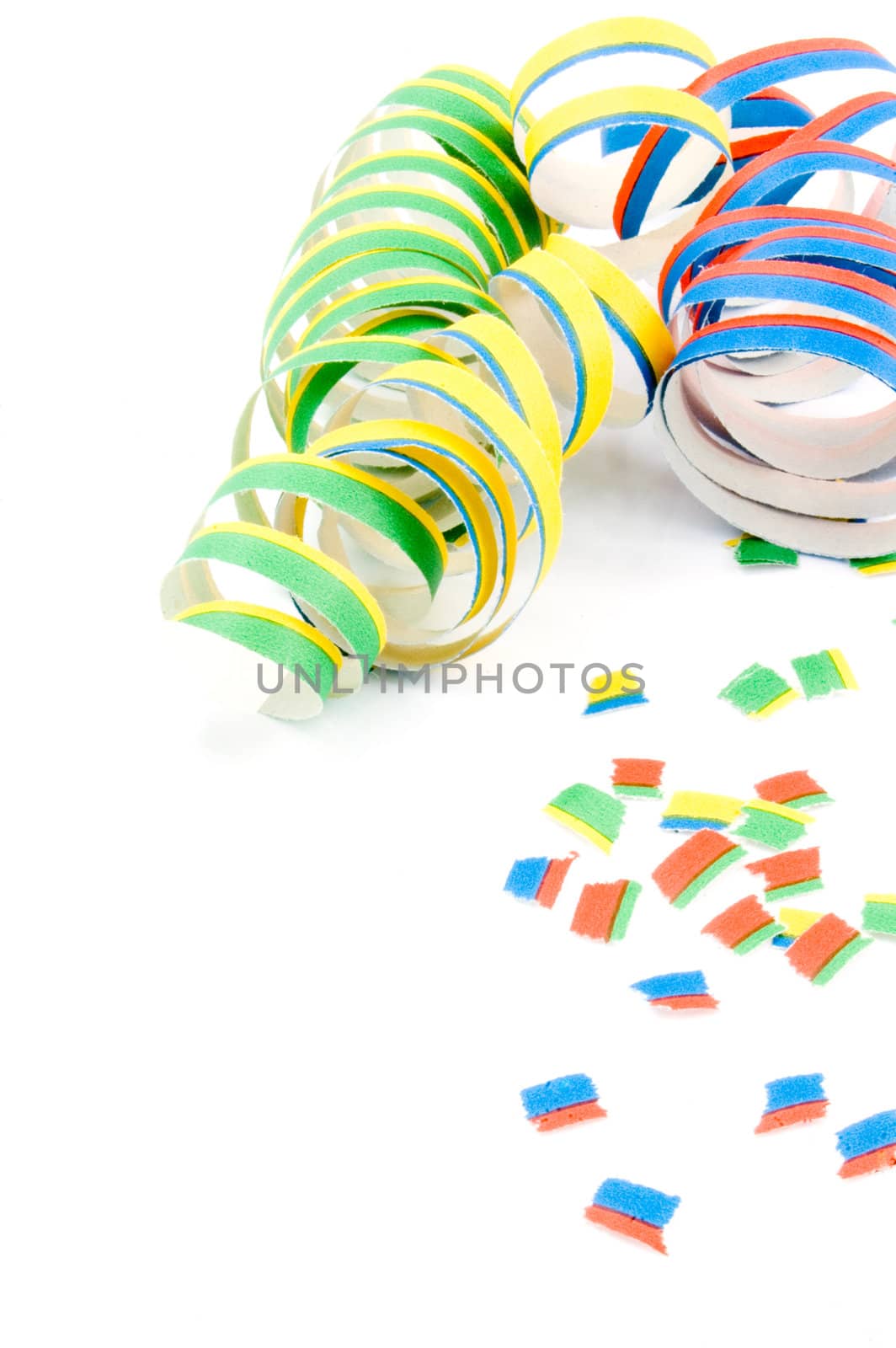 Colorful party streamers isolated on white background by ladyminnie