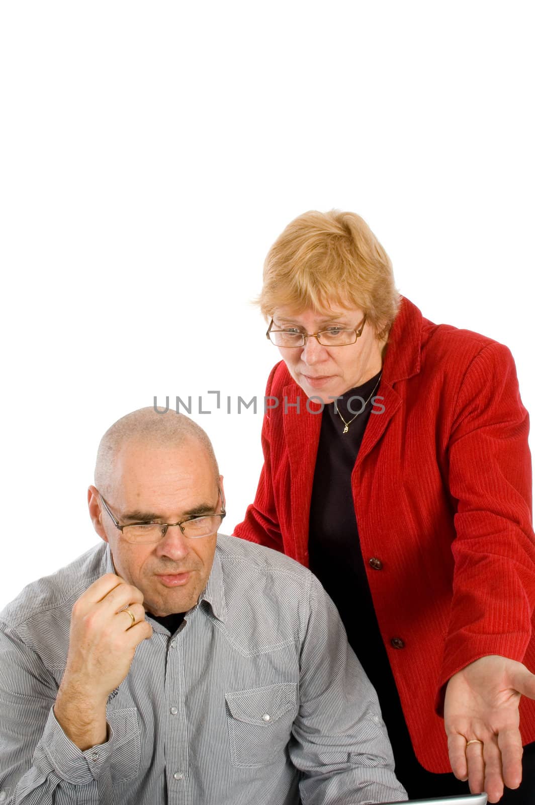 businesswoman is showing her assistence the mistakes on white