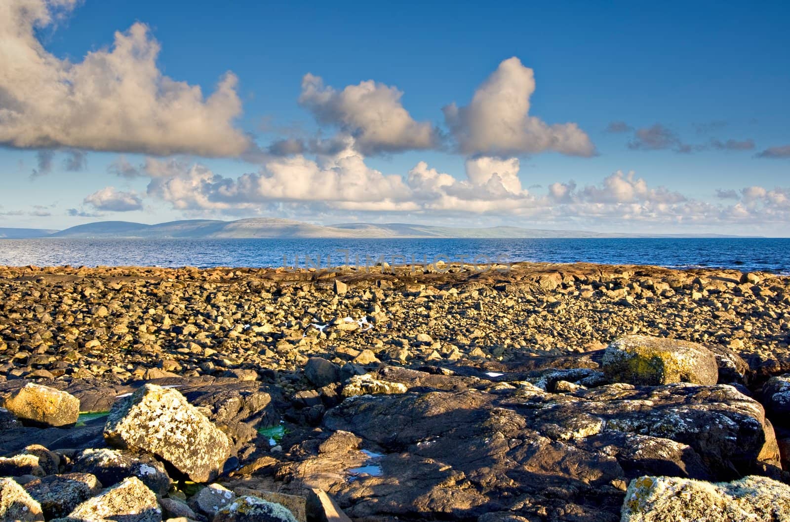 Galway Bay in Ireland with The Burren in the background