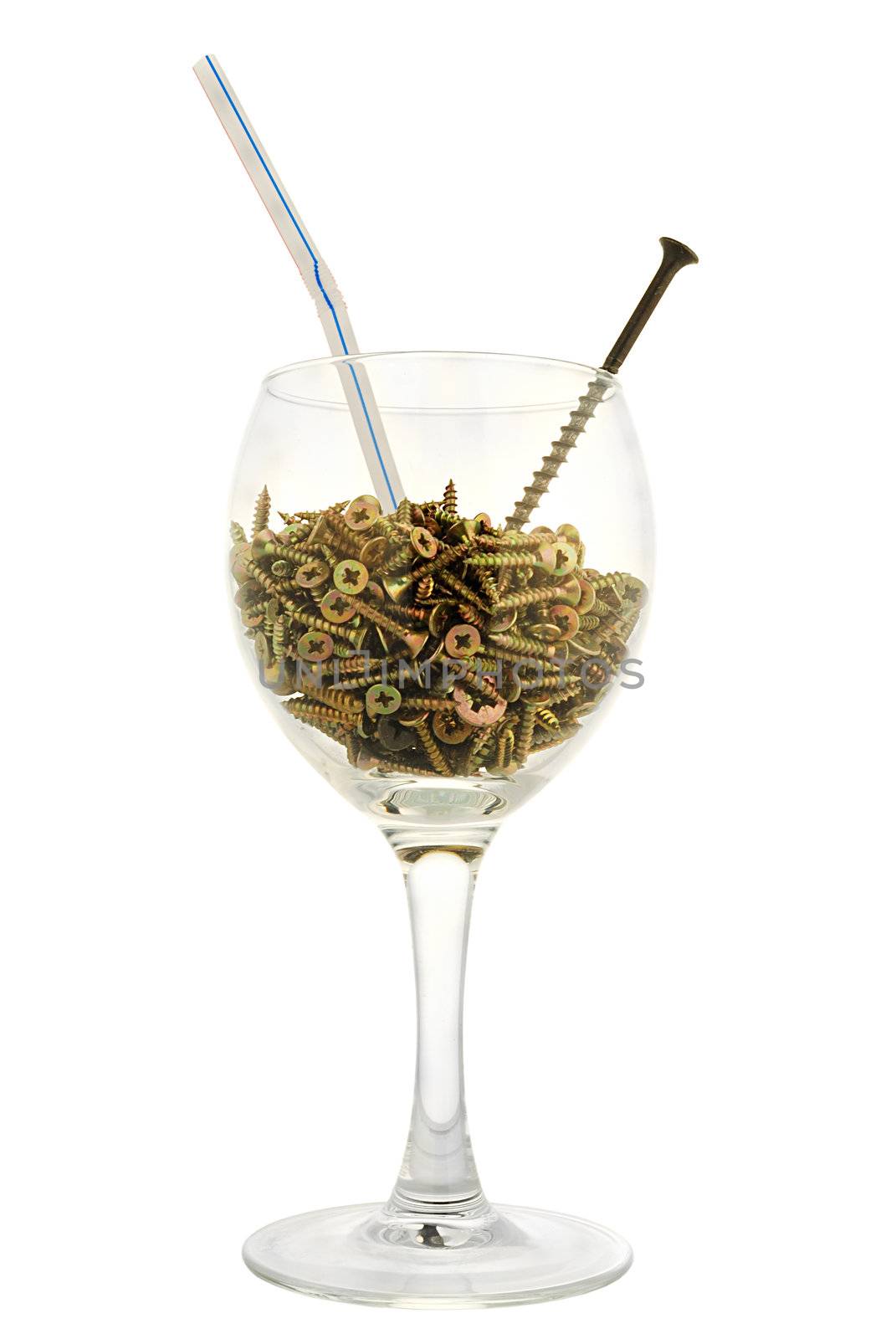 group of brass  screws in one wineglass