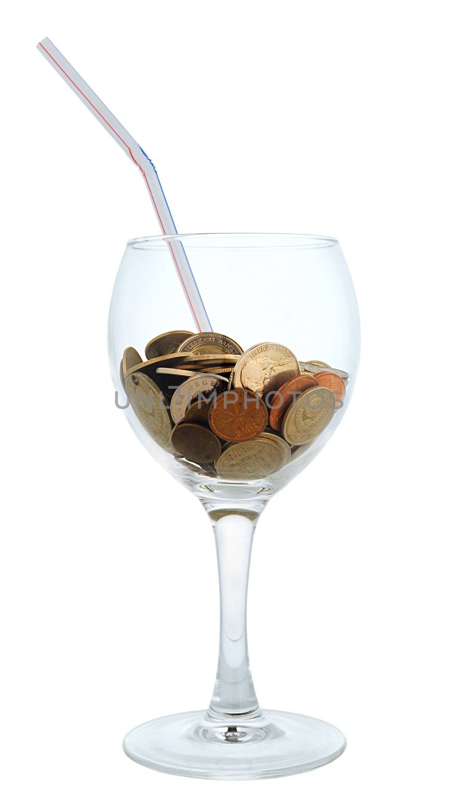 Cocktail: wineglass with the heap of coins and straw