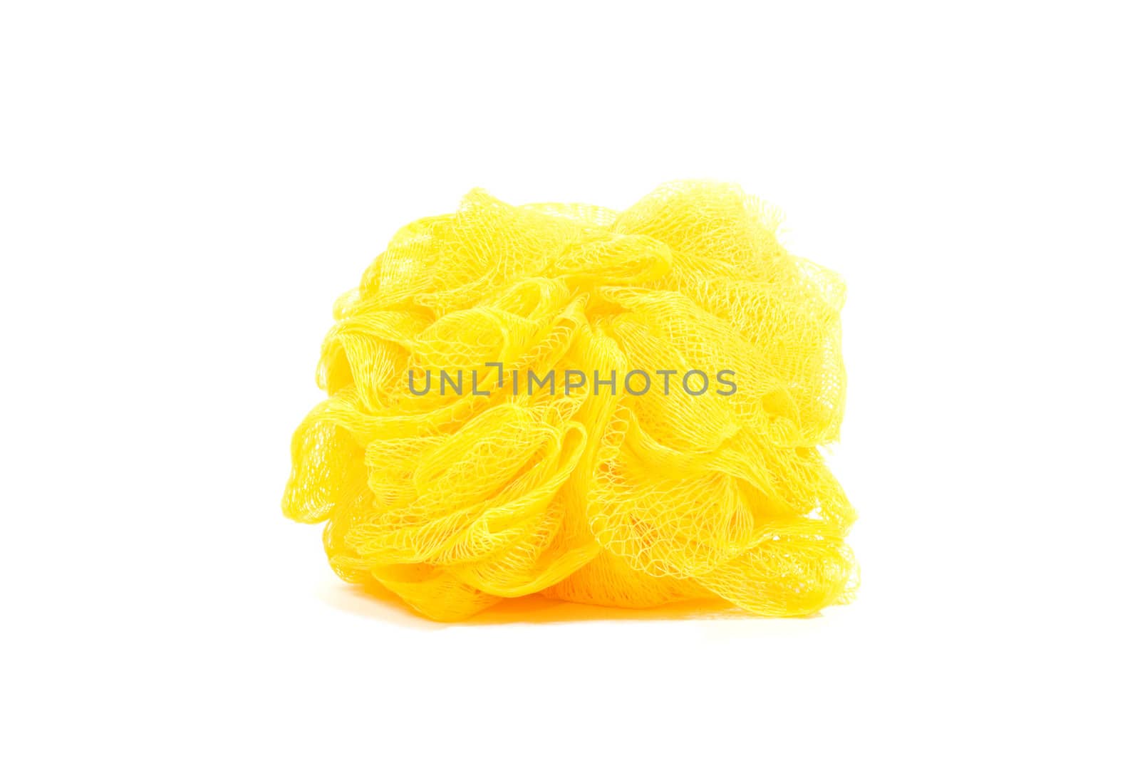 yellow bath sponge or loufah, isolated on white by ladyminnie