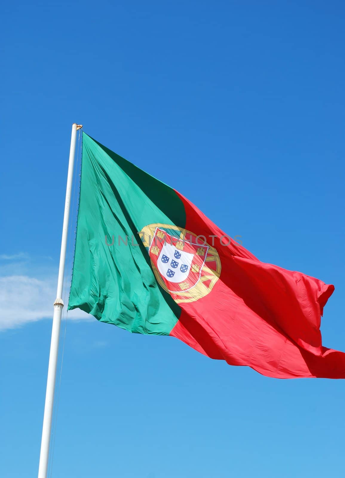 portuguese flag against blue sky background