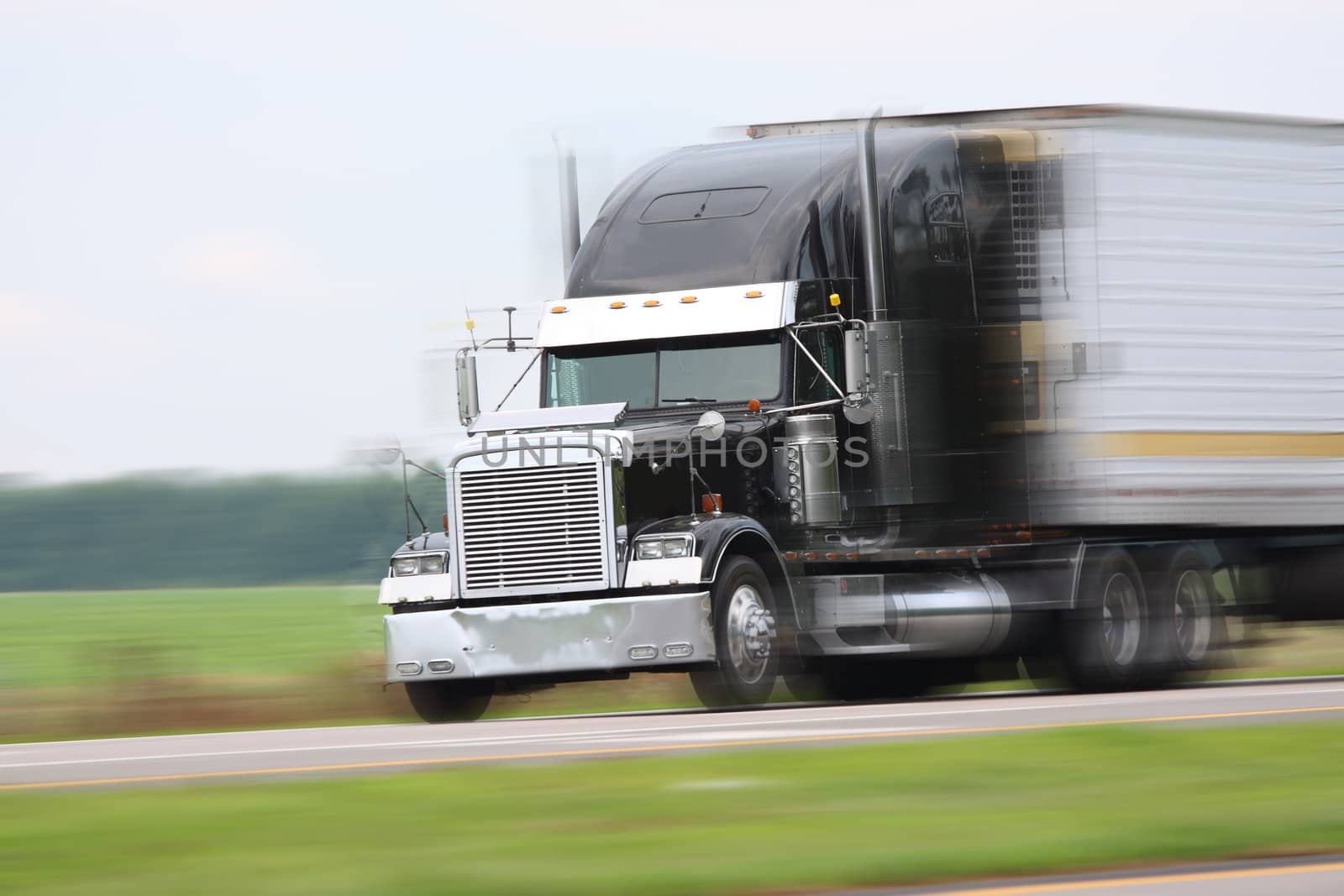 cargo truck driving on road