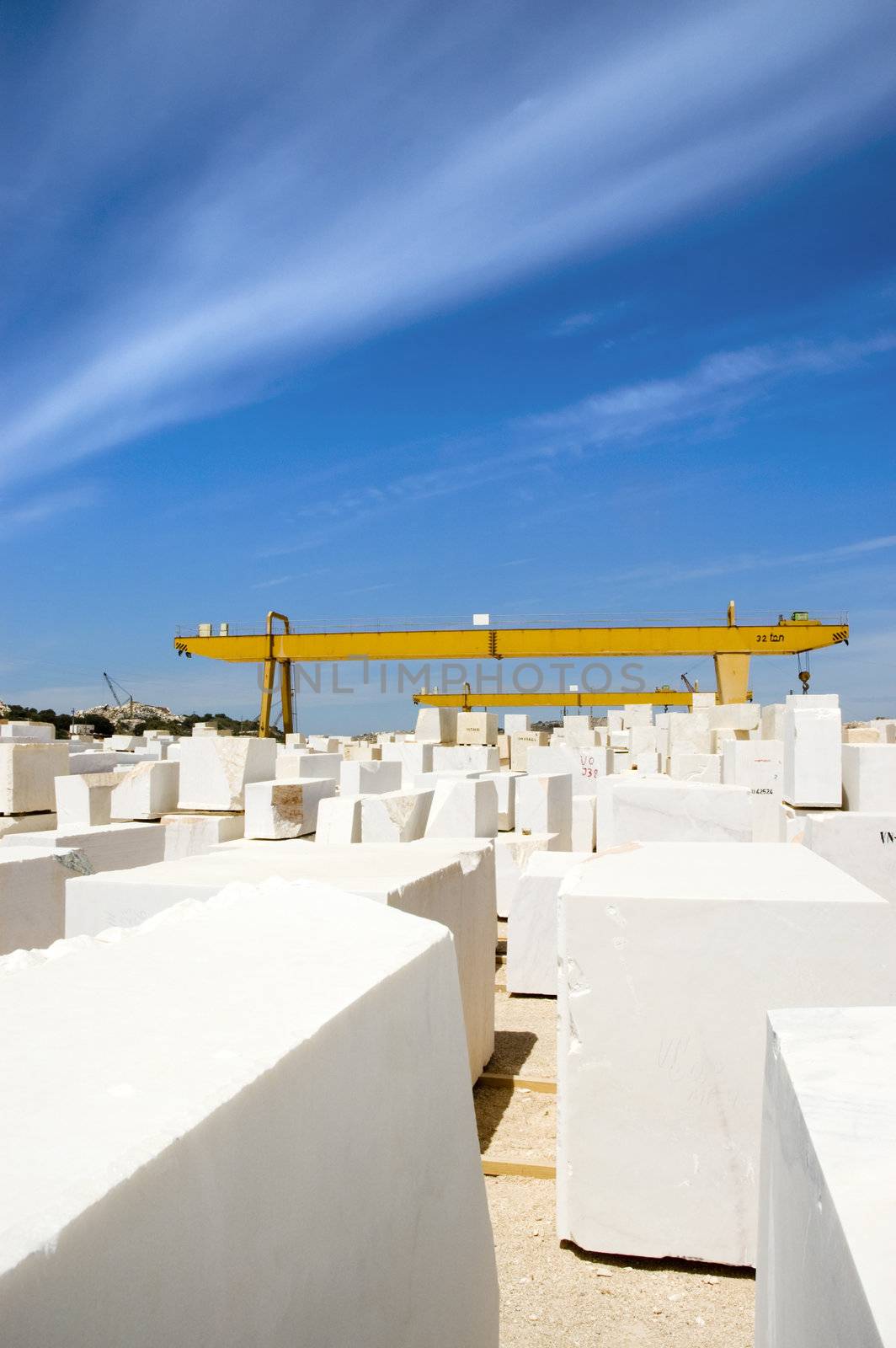 Marble blocks aligned in factory yard, Alentejo, Portugal