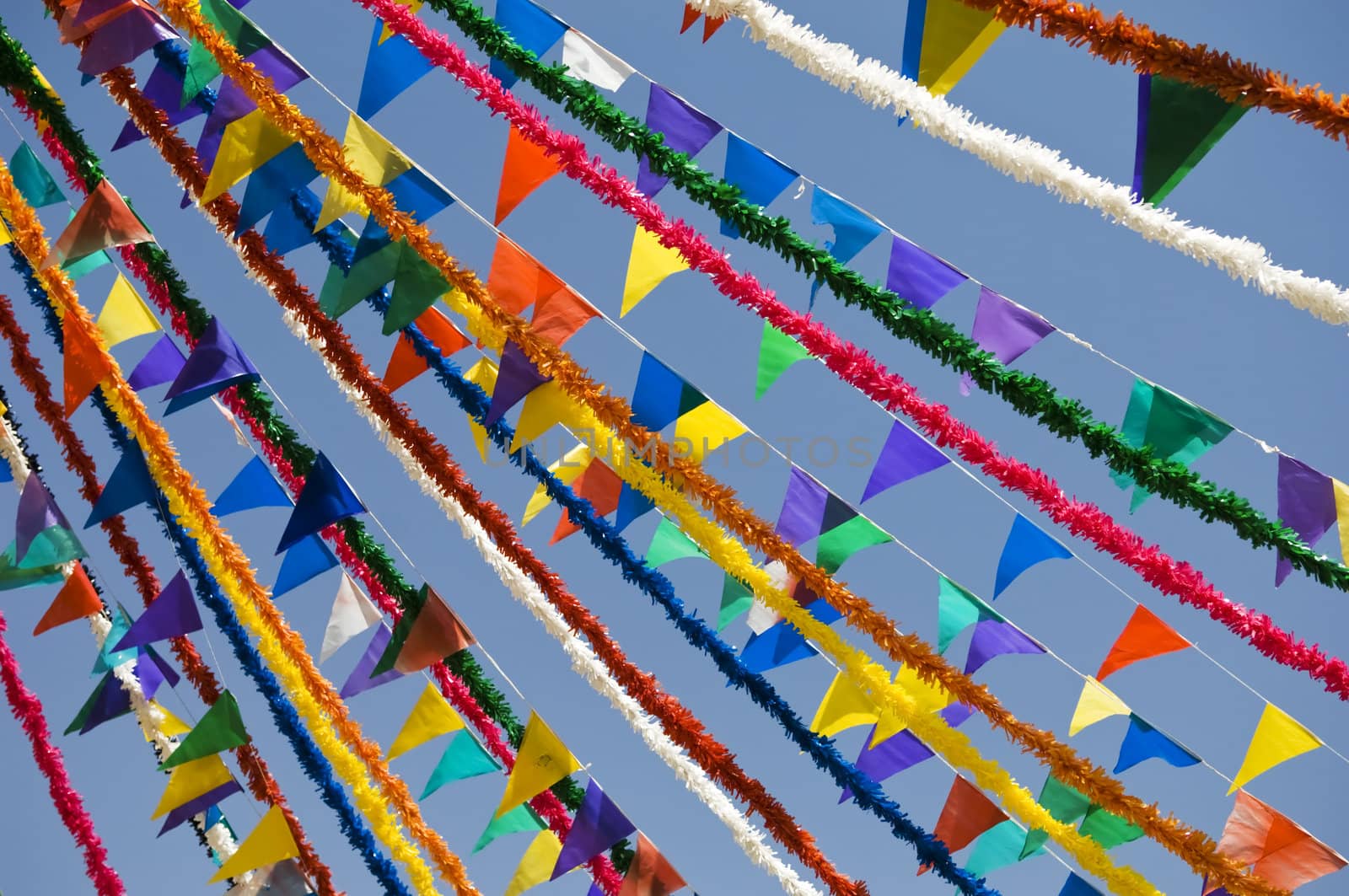 Rows of multicolored festive flags