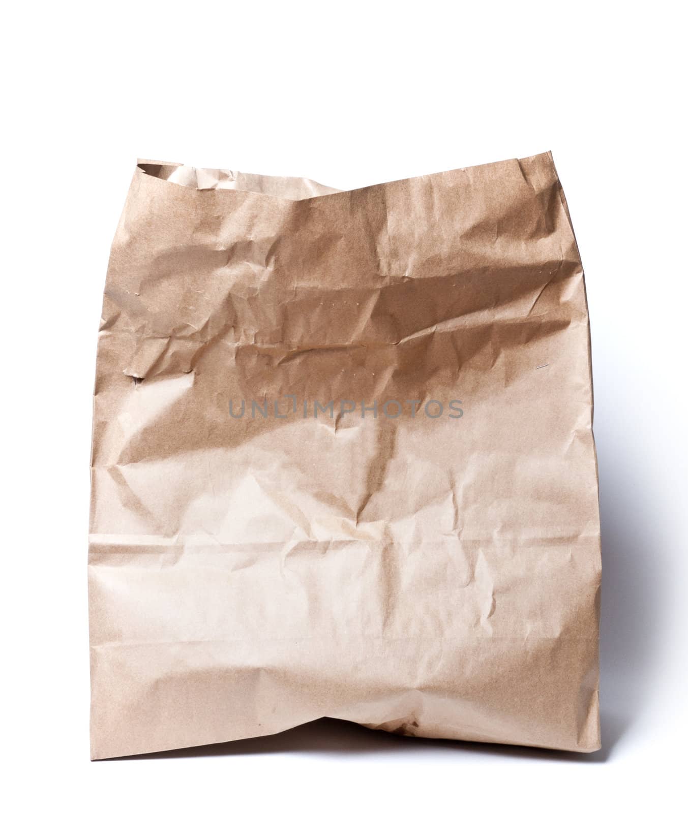 Isolated image of used brown paper bag made of recycled paper