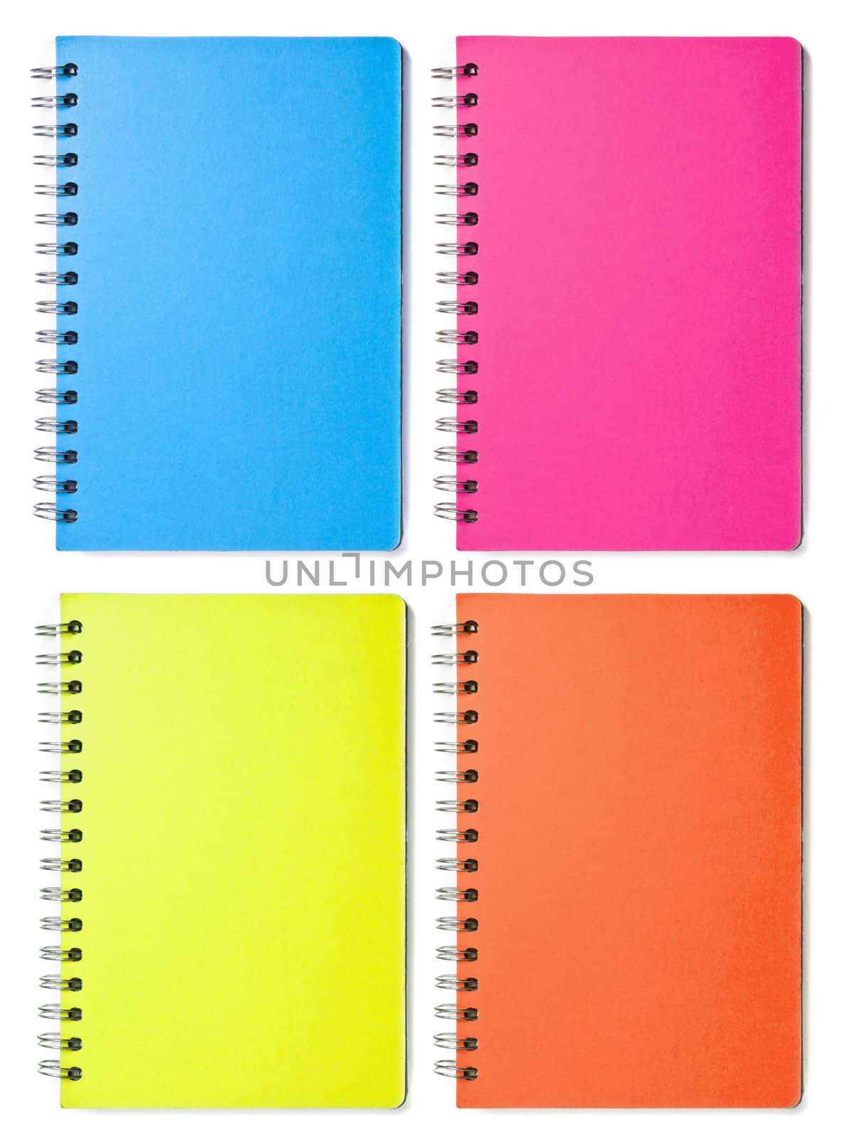 Isolated image of four colored blank vertical spiral notebooks
