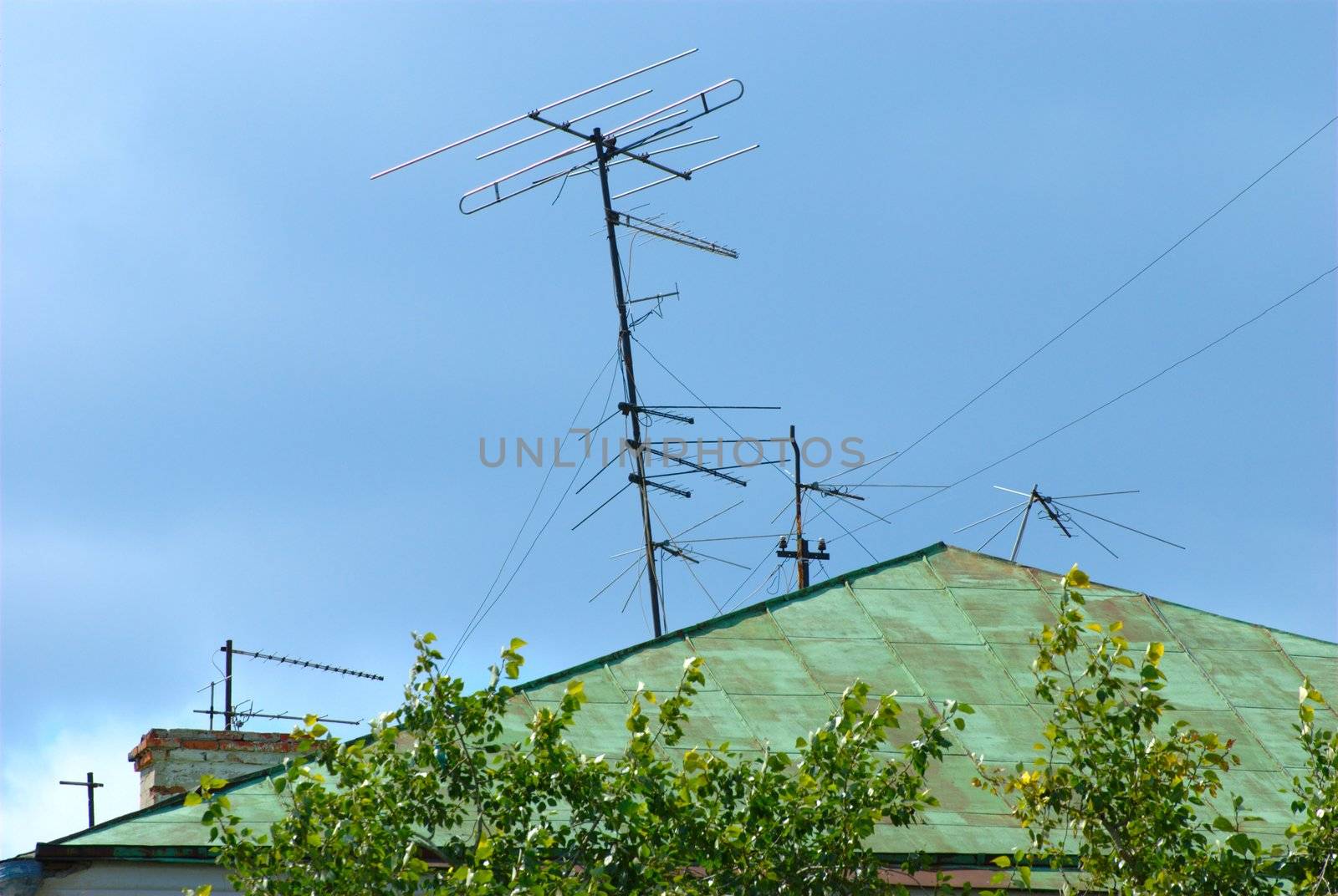 TV antenna on the roof of a residential building