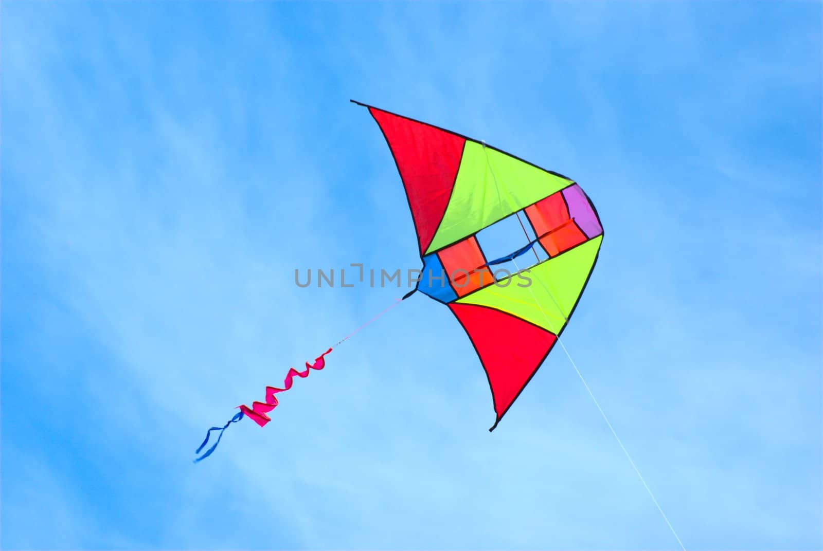 Kite flying in the sky by Light