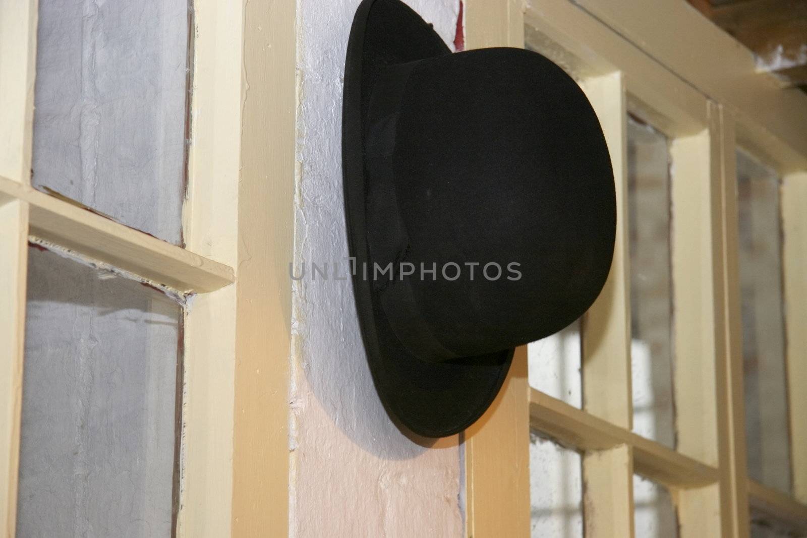 in the old days the supervisor wore a bowler hat, here it is hanging in his office