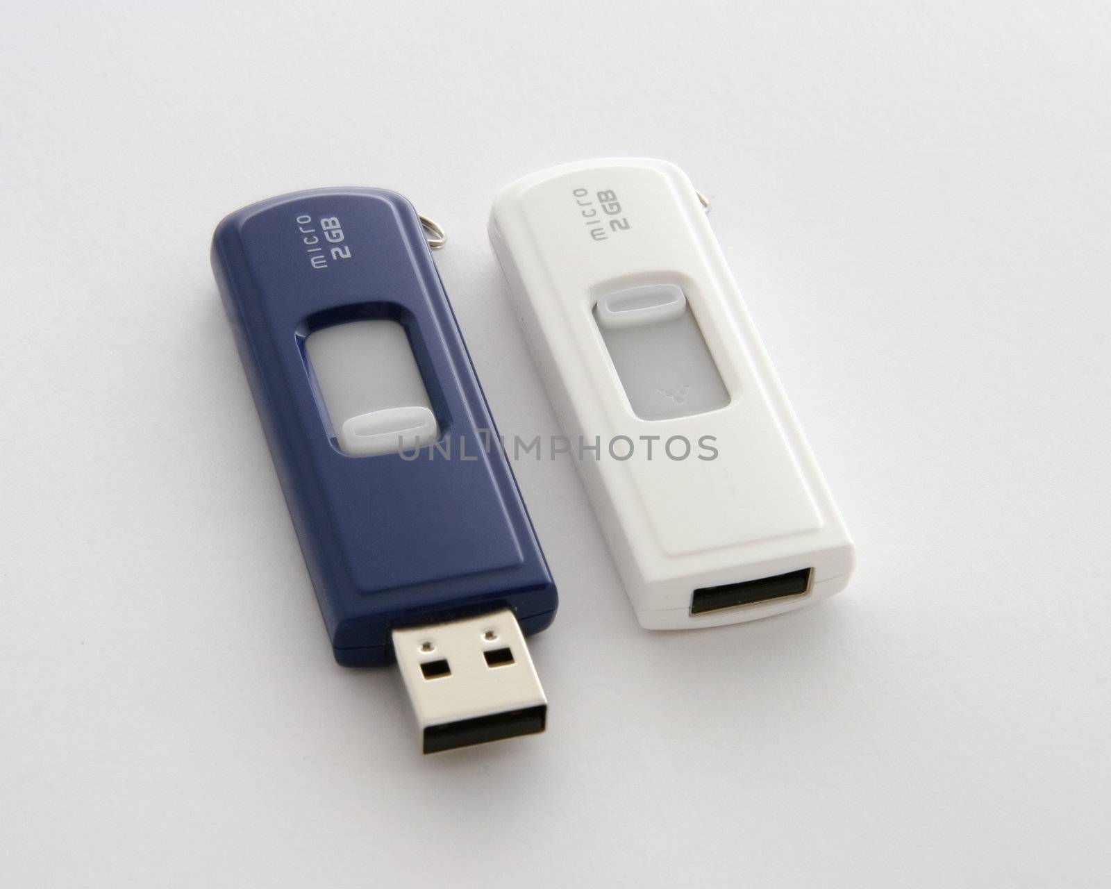 two flash drives used to transfer data from computer to computer
