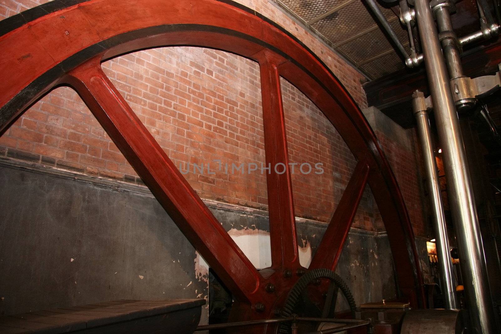 restored pump wheel driven by steam to move pump water for the water board