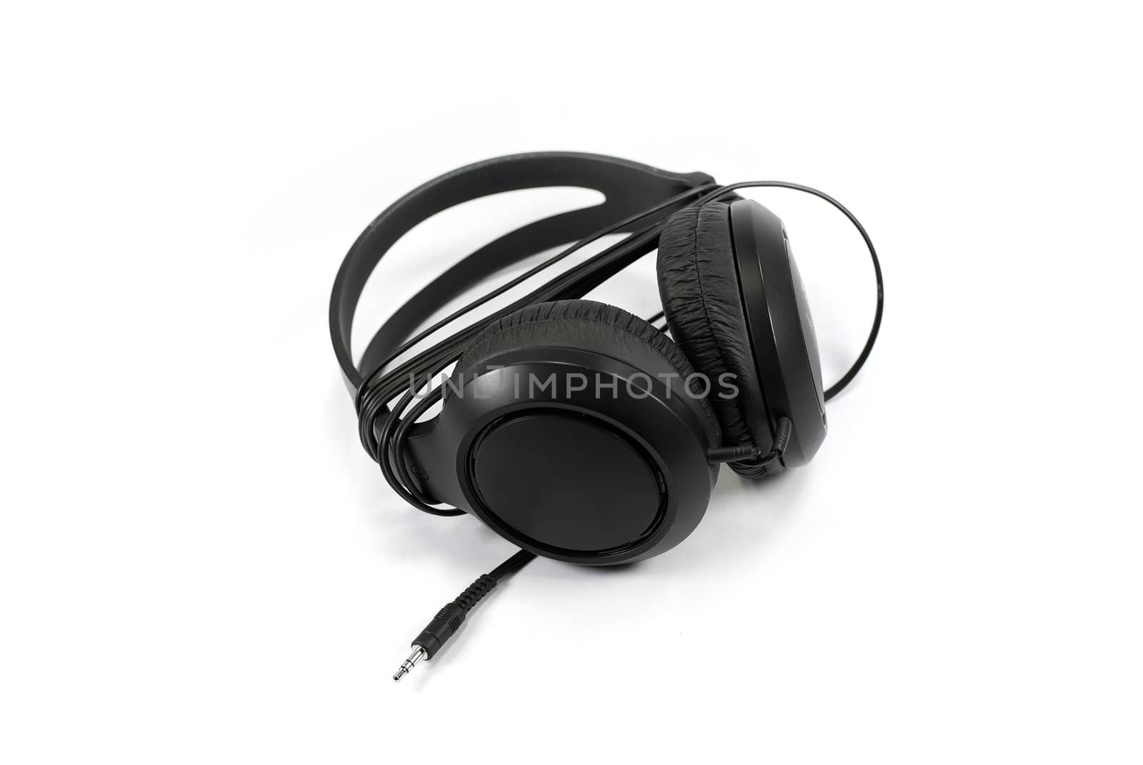 a pair of headphones on white