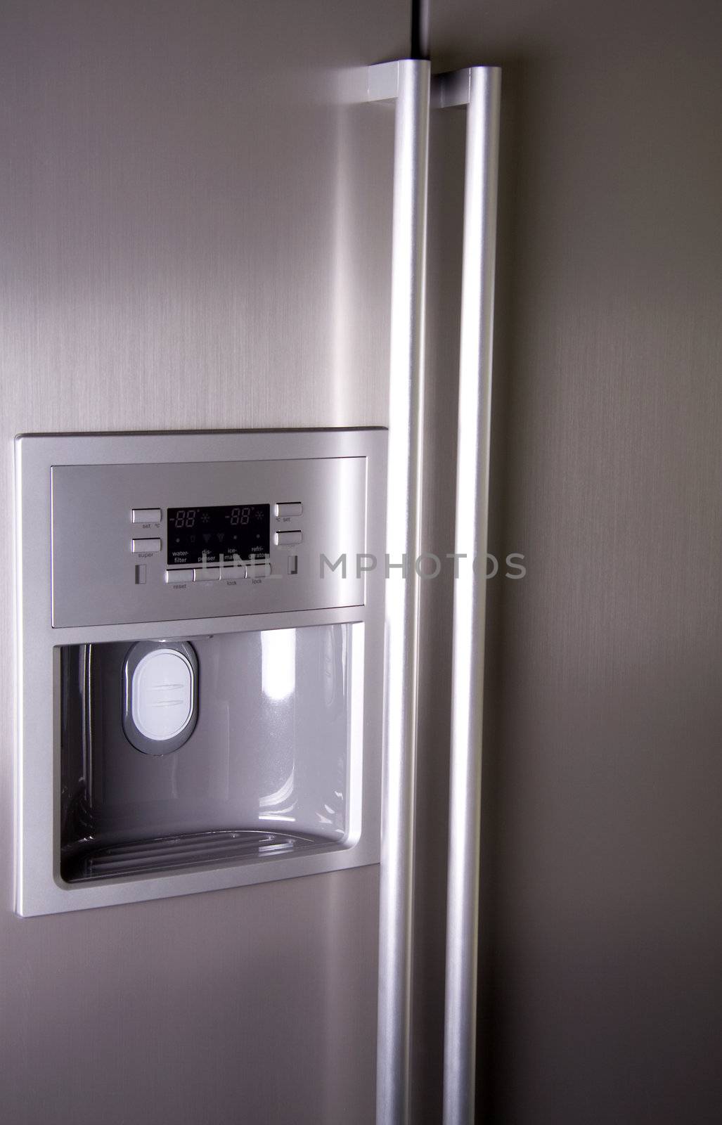 Front of modern refrigerator that can make ice cubes