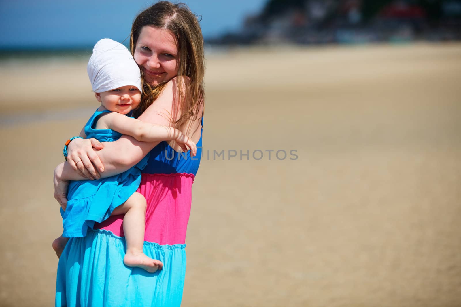 Family at the beach by shalamov