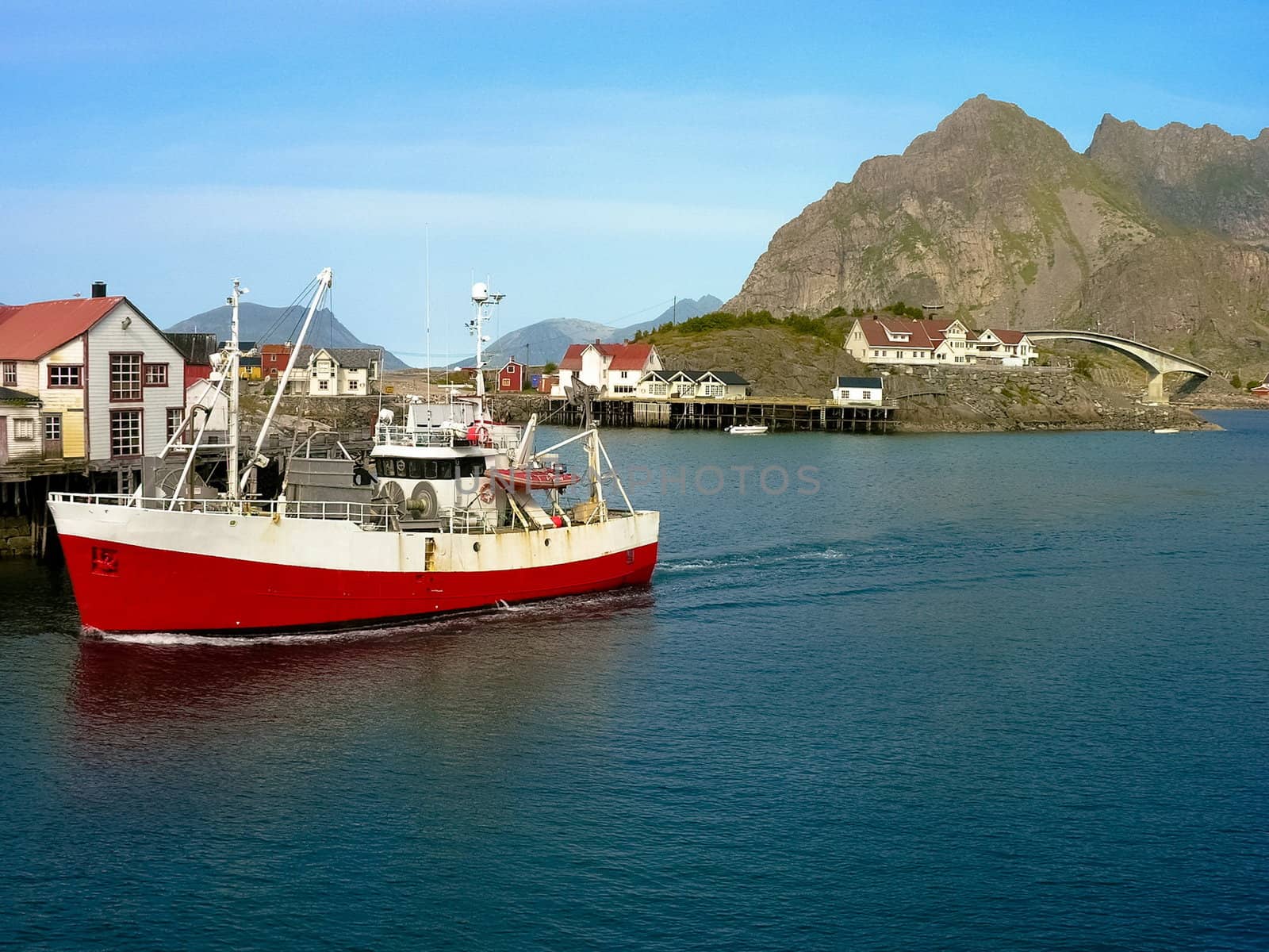 Norwegian boat on blue sea in lofoten island, Norway