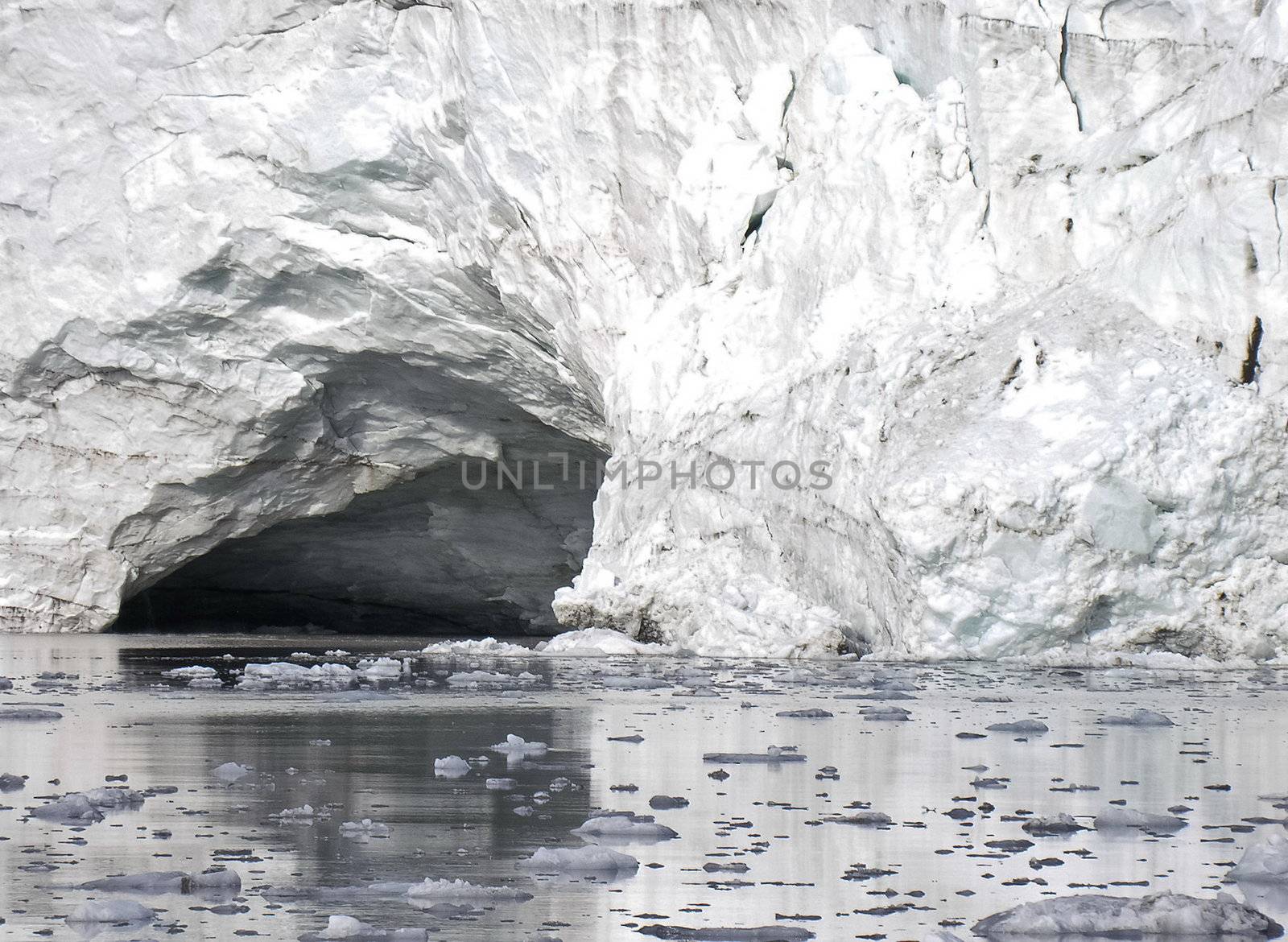 Natural artic cave in a glacier on the ocean in Svalbard,Norway