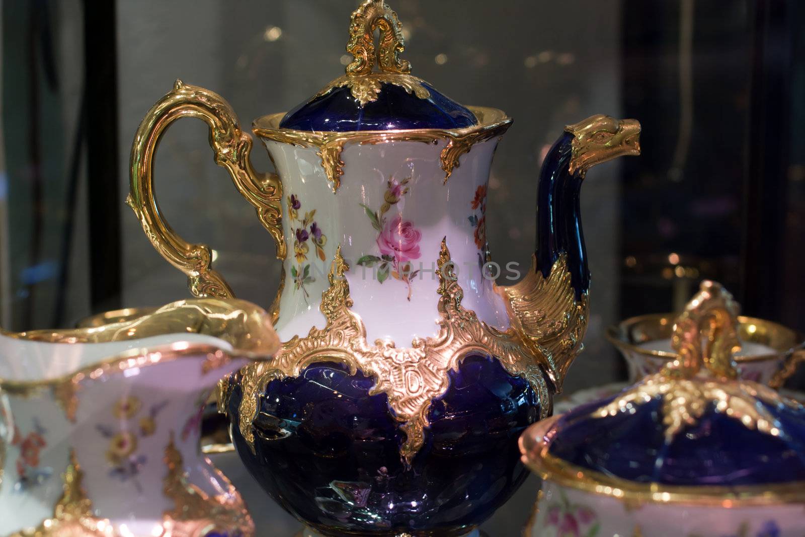 Antique porcelain coffee set in show case by GunterNezhoda