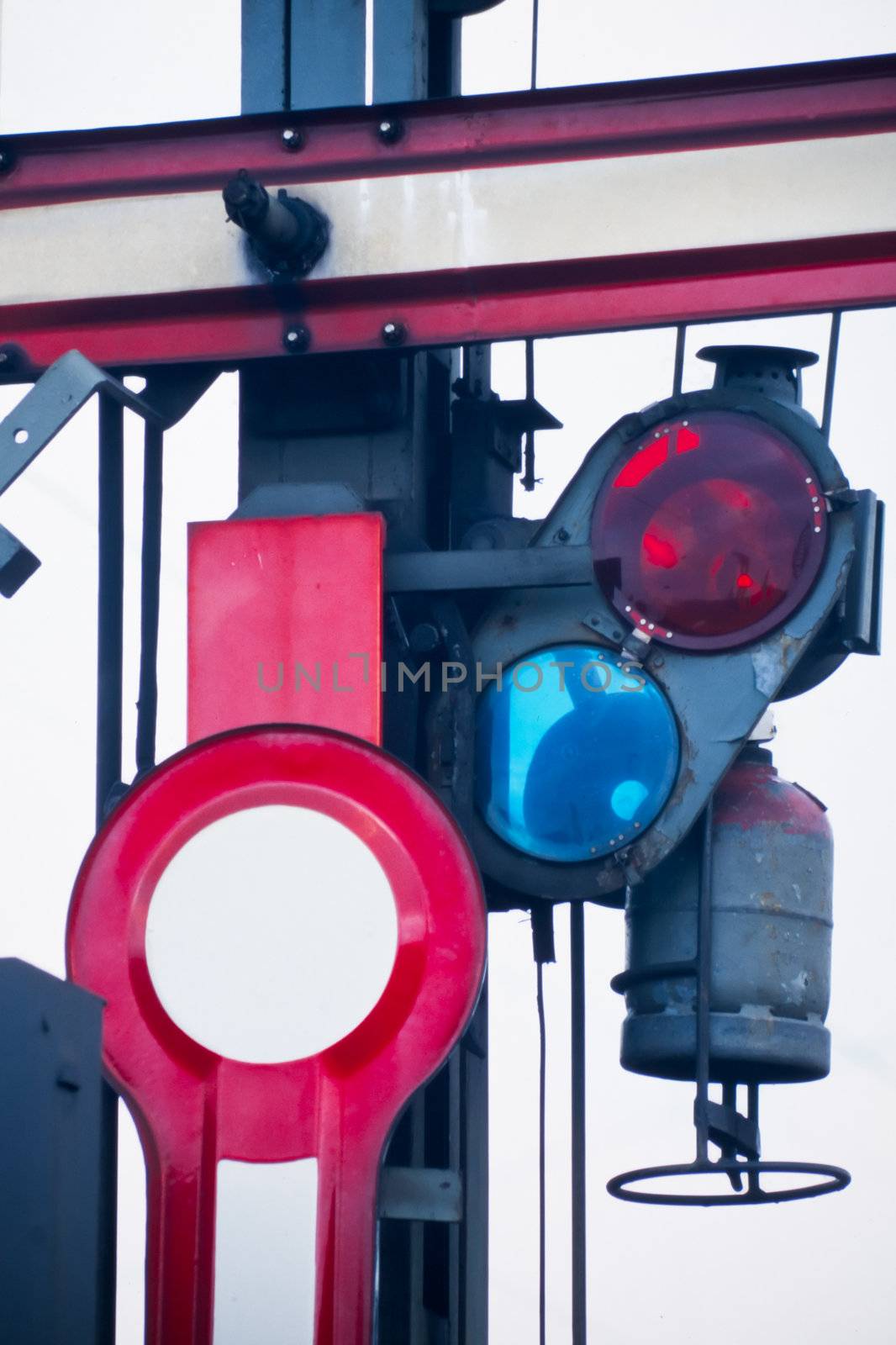 Closeup of old railway semaphore with propane signal light.