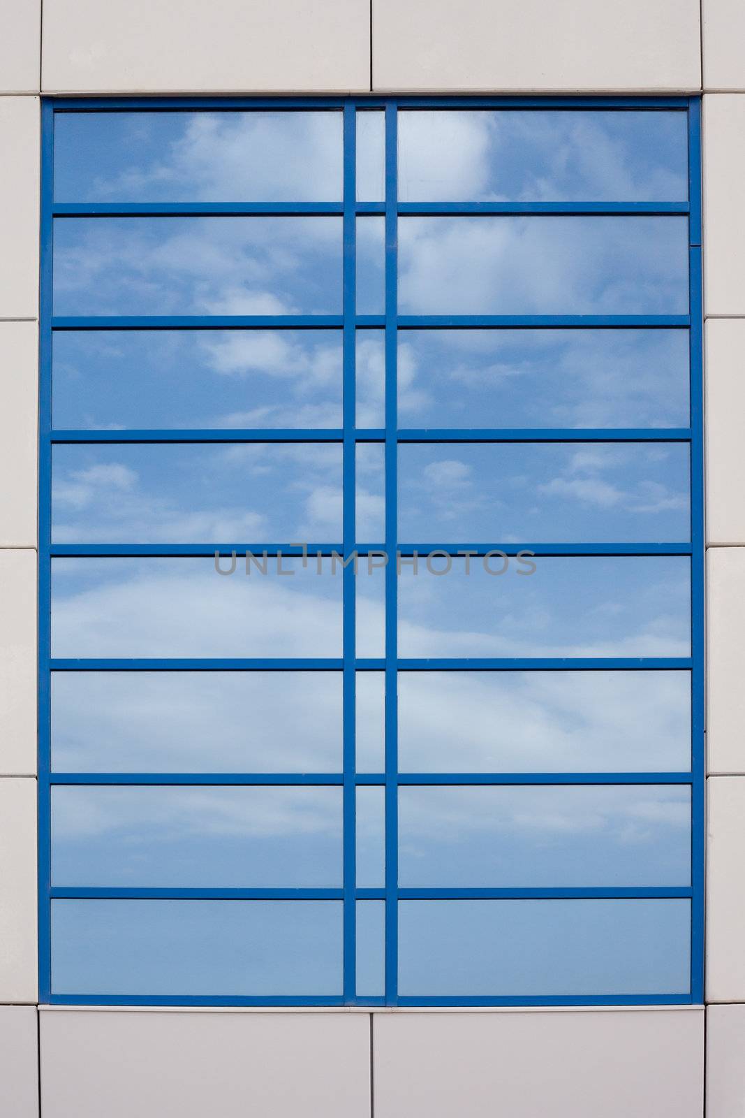 Reflective Window mirrors blue sky by PiLens