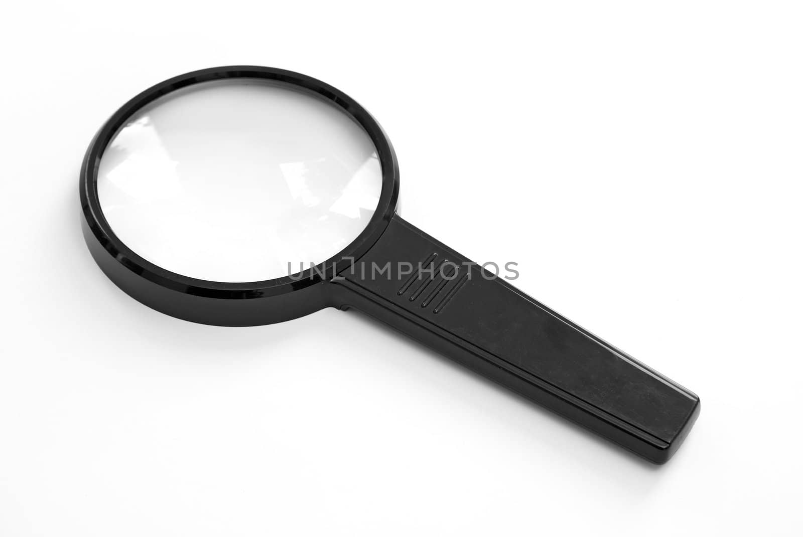 An isolated magnifying glass over white background.