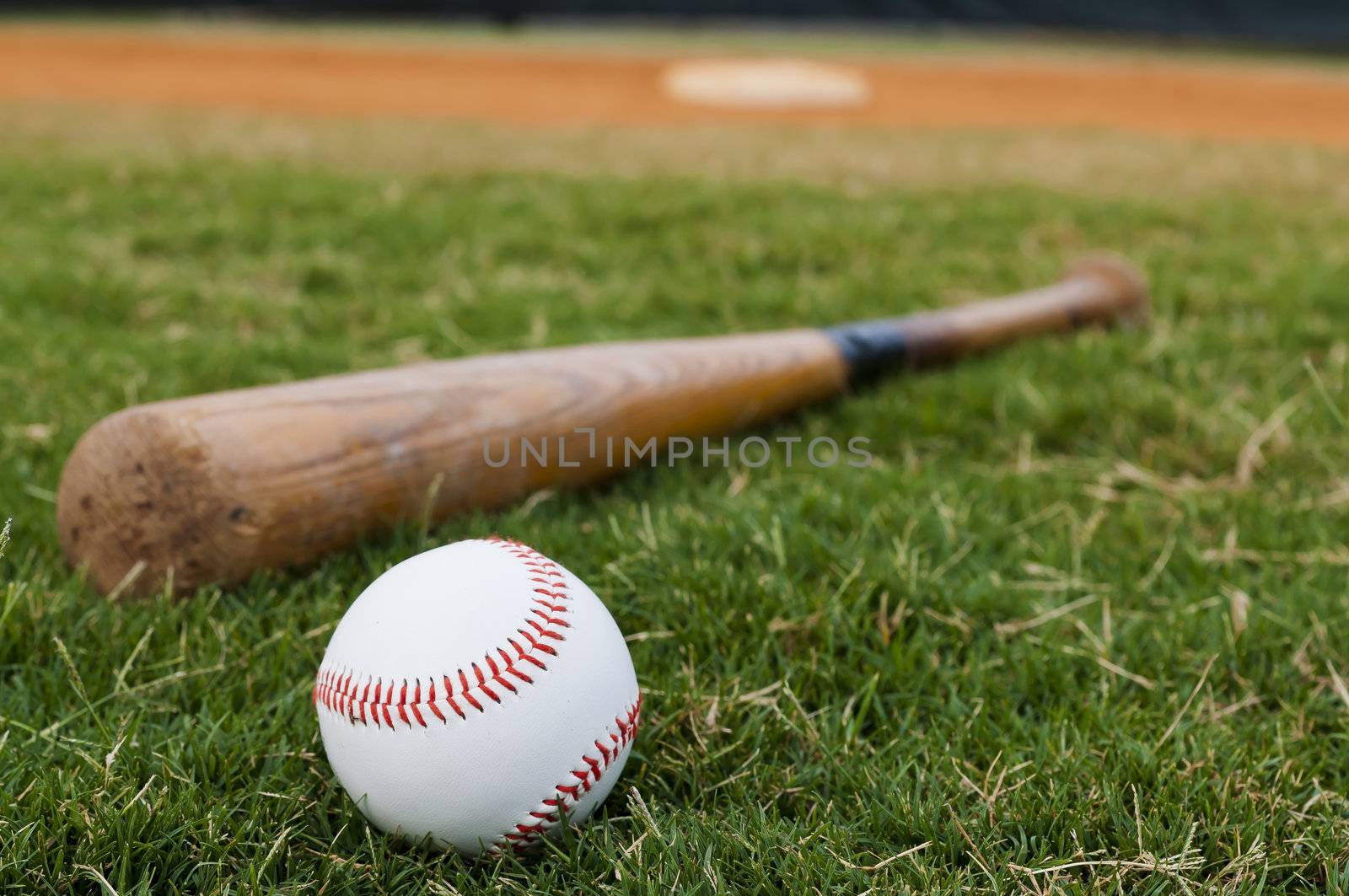 Baseball and Bat on Field by dehooks