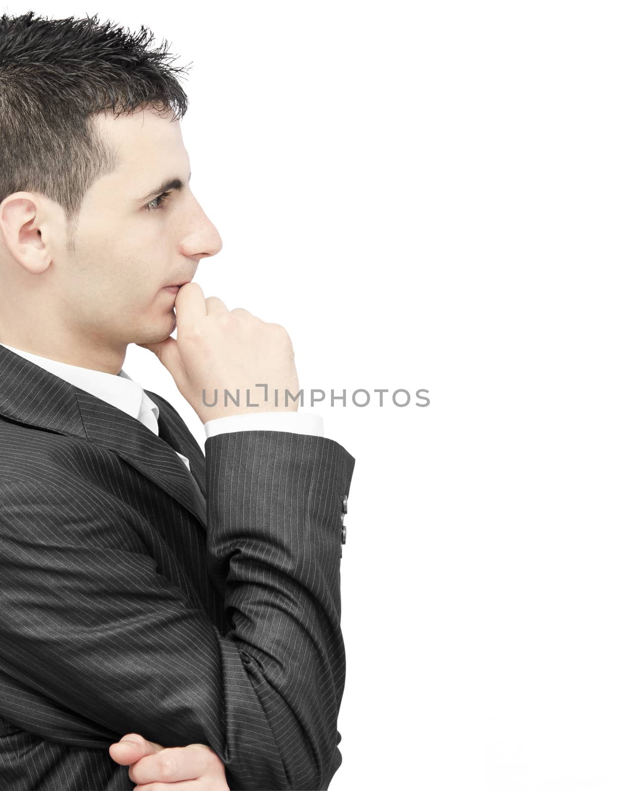 Young businessman thinking isolated on white background