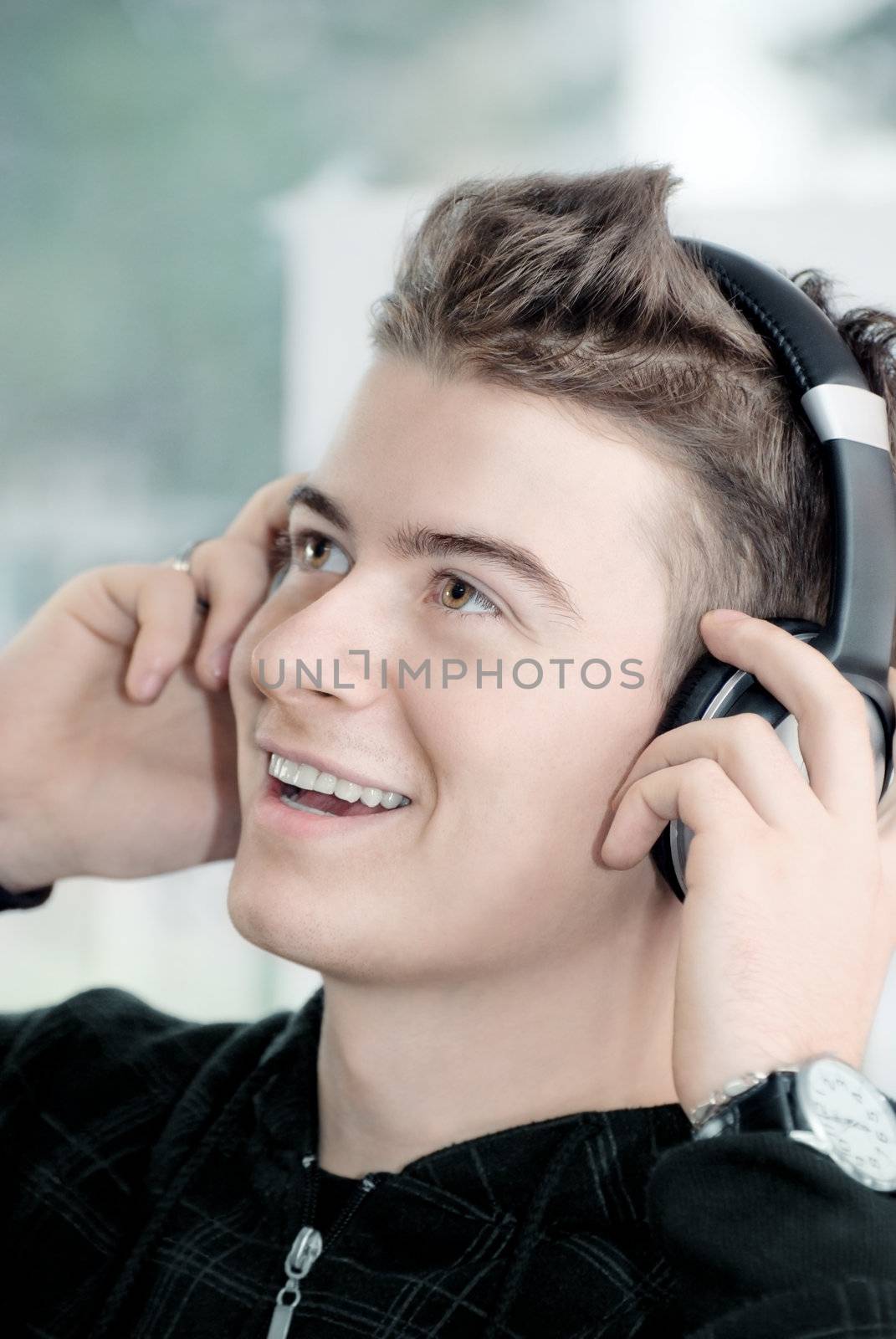 A young man listening to music