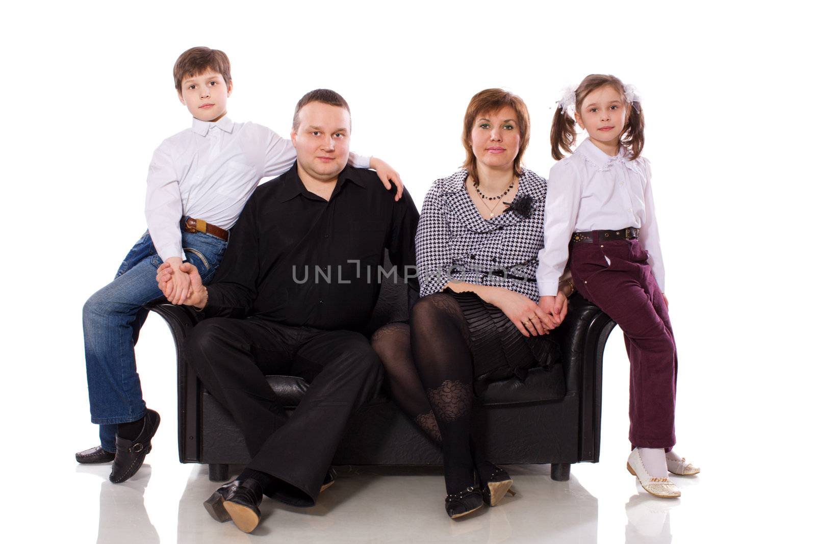 Happy Family posing together isolated on white