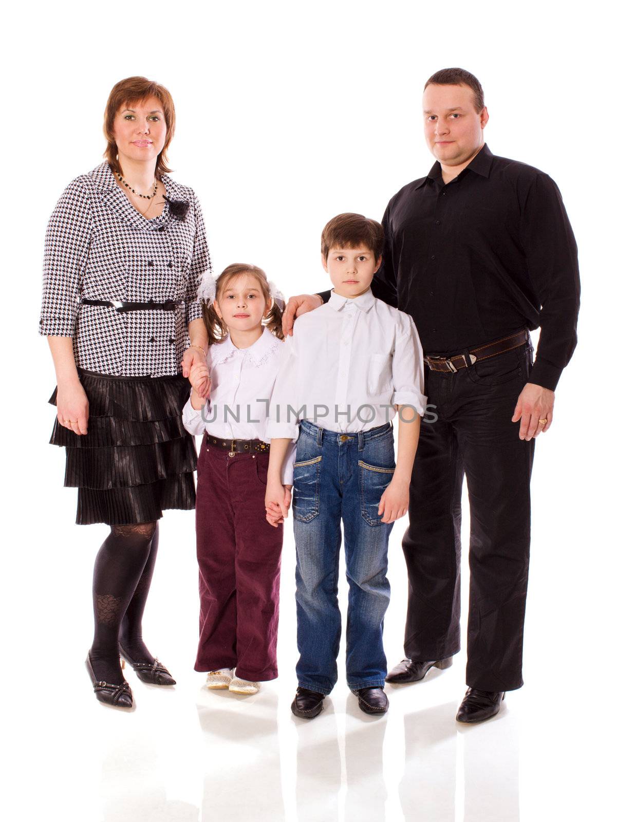 Happy Family posing together isolated on white