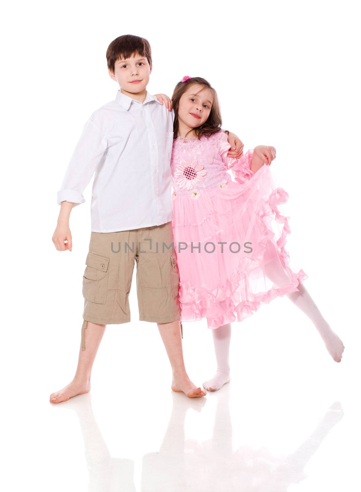 brother and sister posing together isolated on white