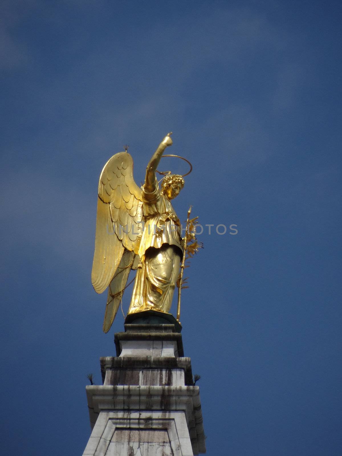 Venice with St Gabriel statue on Campanile's top on ST Mark's square