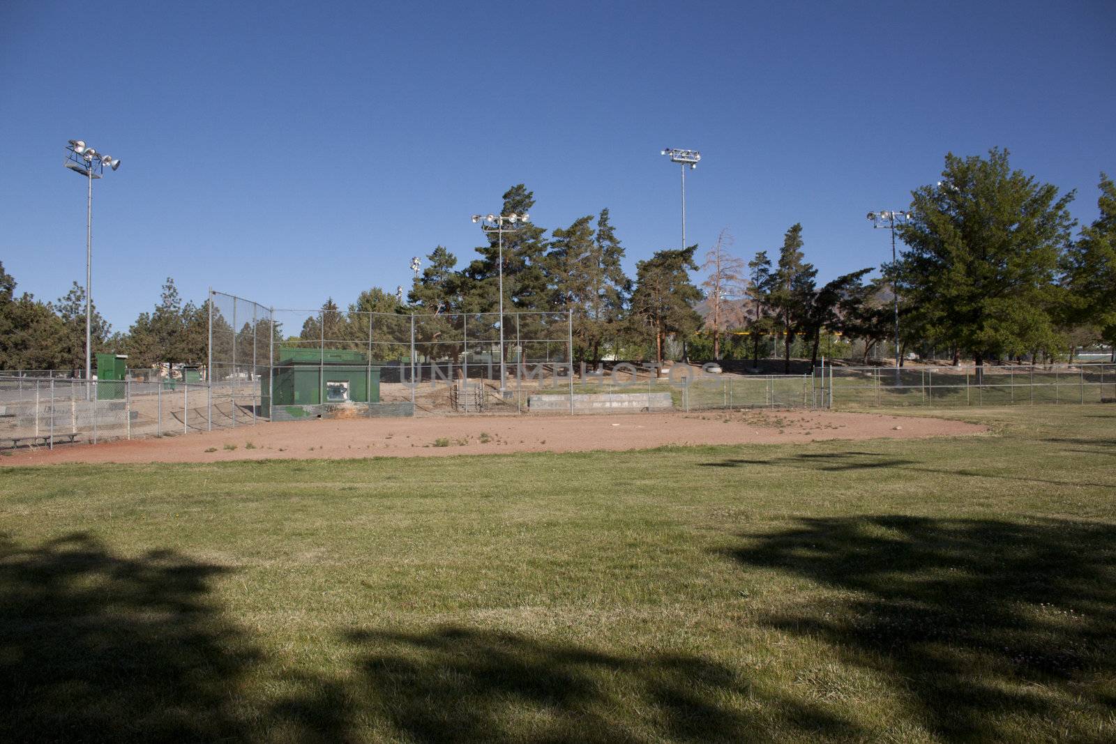 Baseball field - grass diamond empty green recreation lawn by jeremywhat