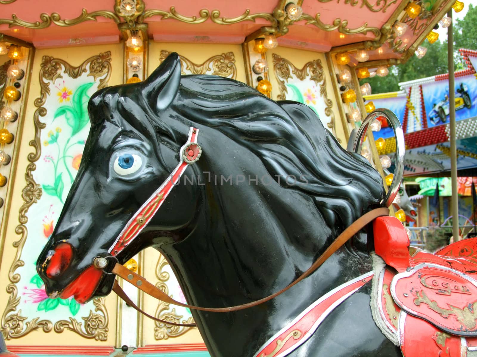 Black carnival carousel Horse. Shot outdoor