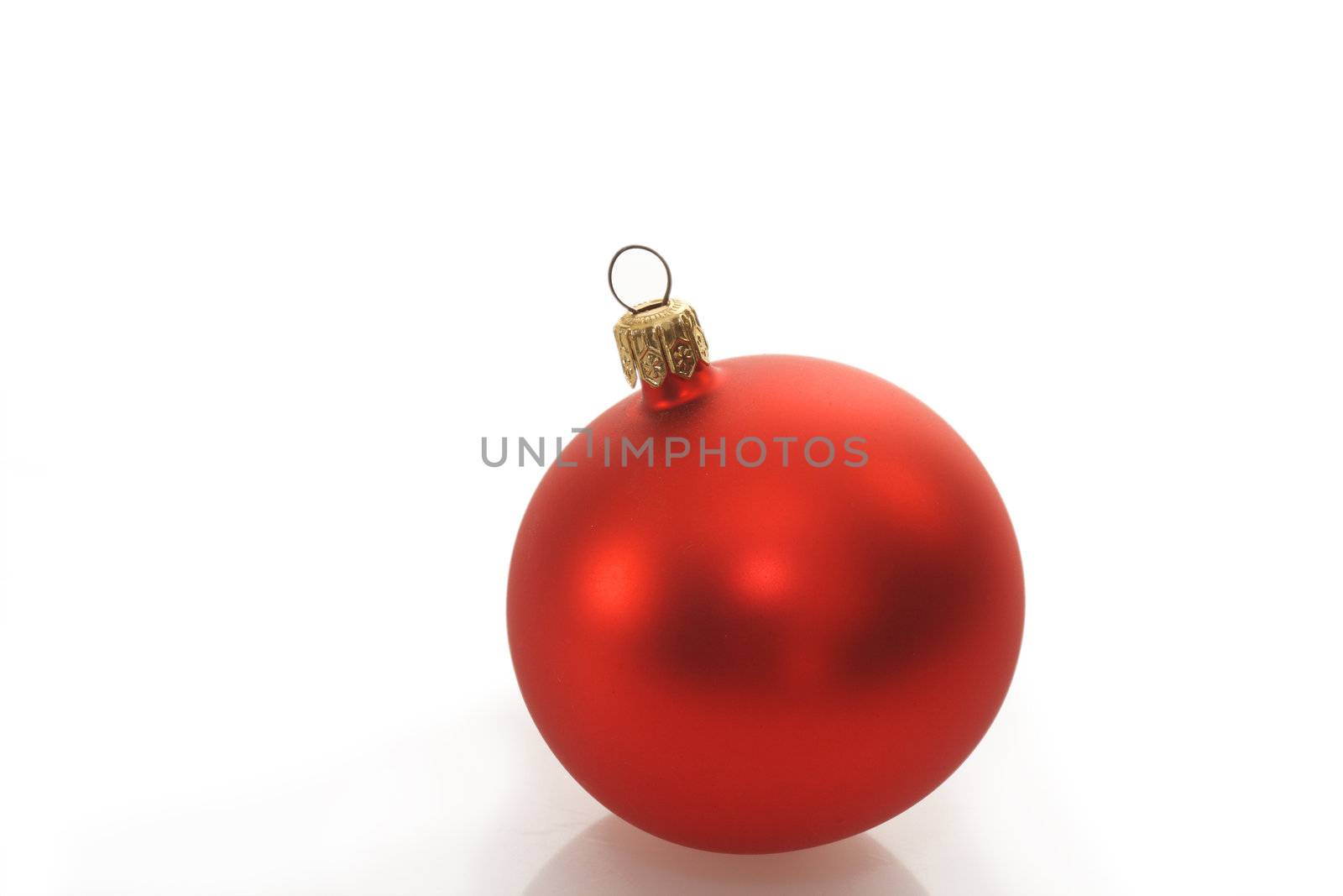 Christmas ball on bright background. Shot in studio.