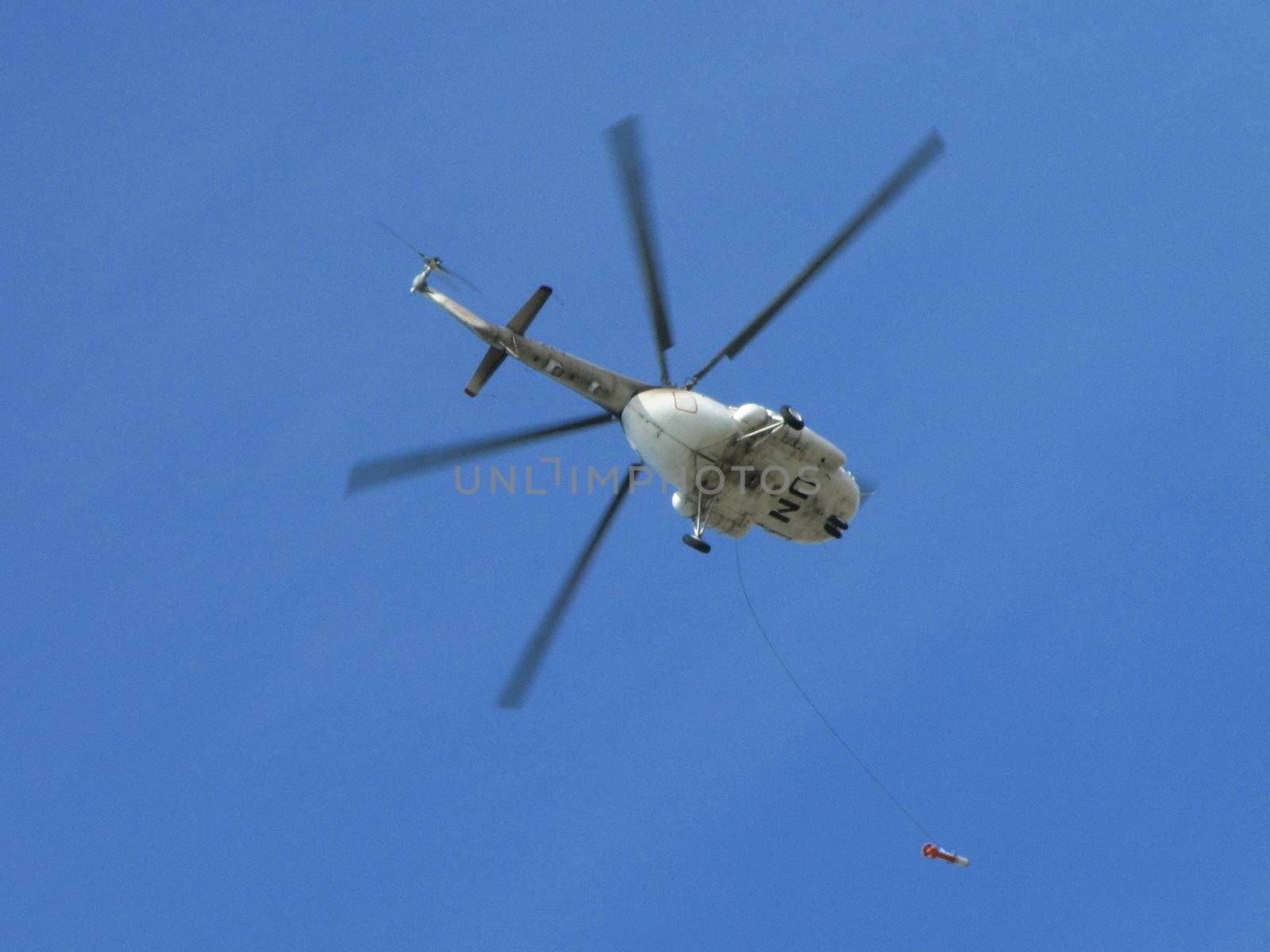 The helicopter carries out the task