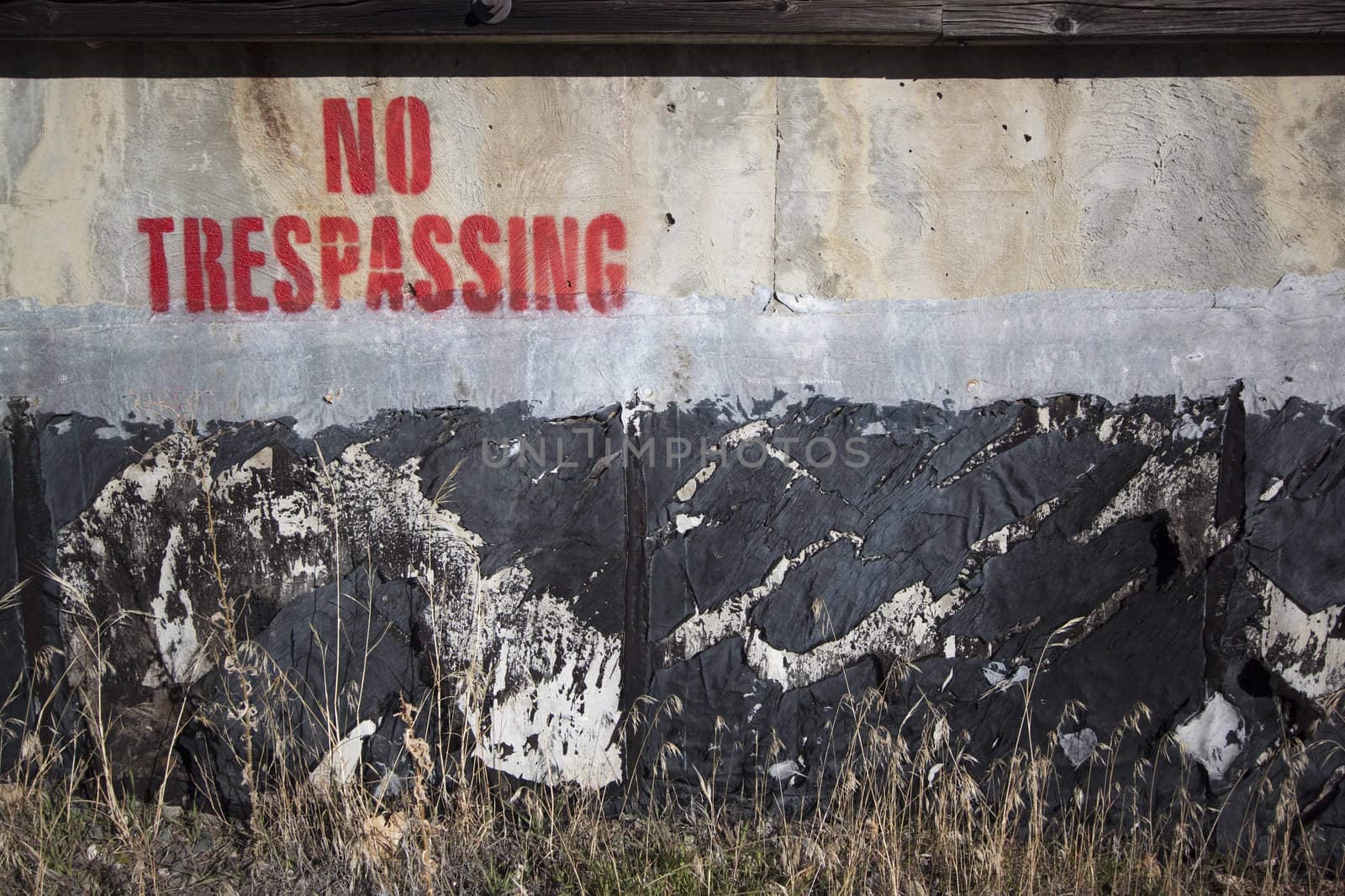 spray painted no trespassing
