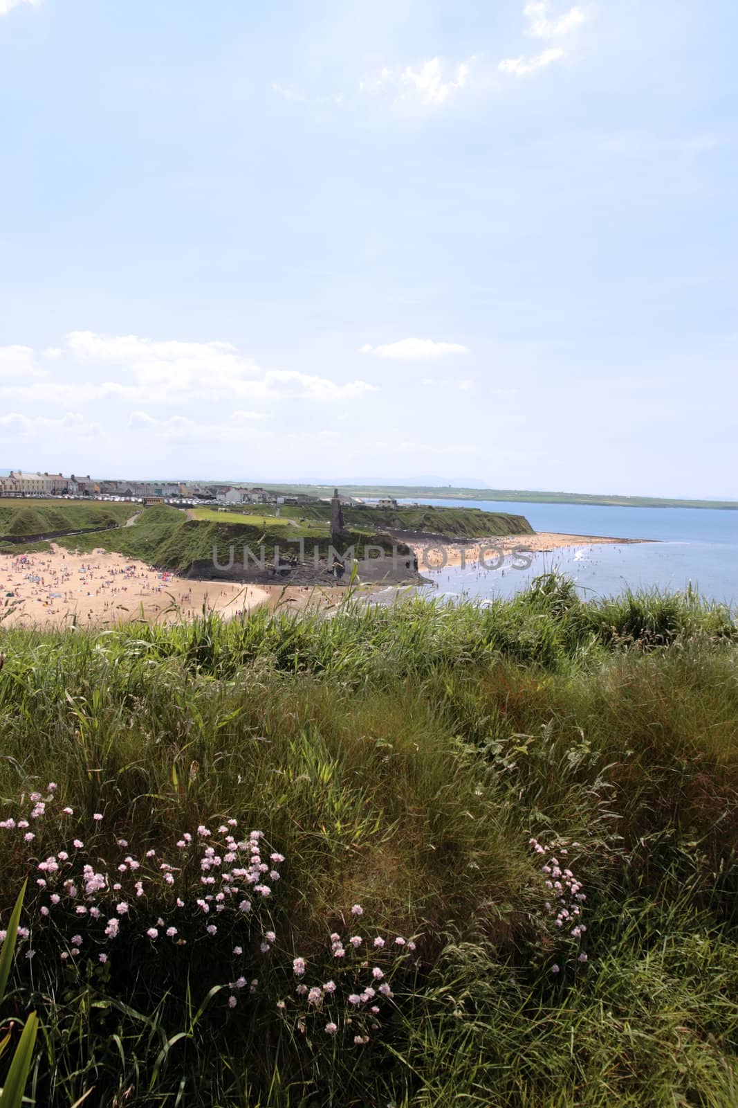 ballybunion beach crowded with people on a hot day