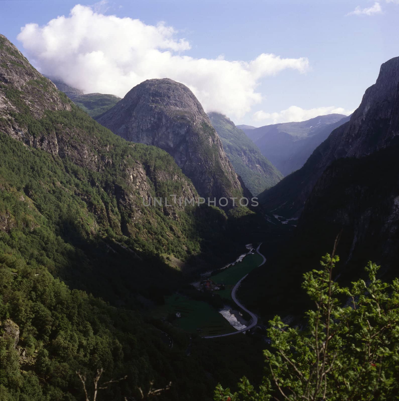 Naeroydal Valley in Norway with mountains and village in valley