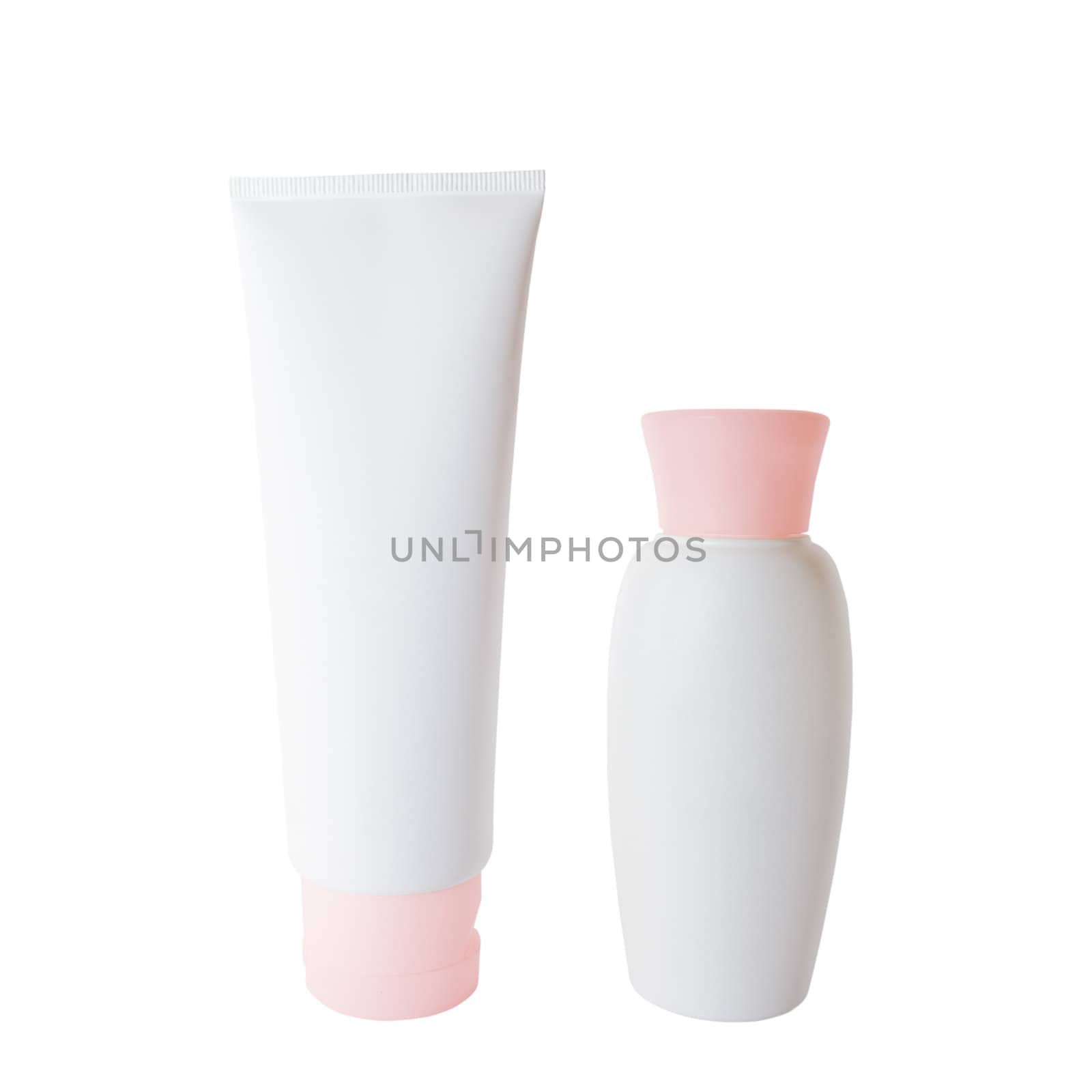 White plastic cream tube and bottle isolated over white