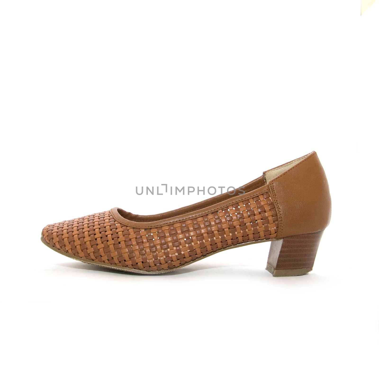 Brown wicker woman shoe isolated over white