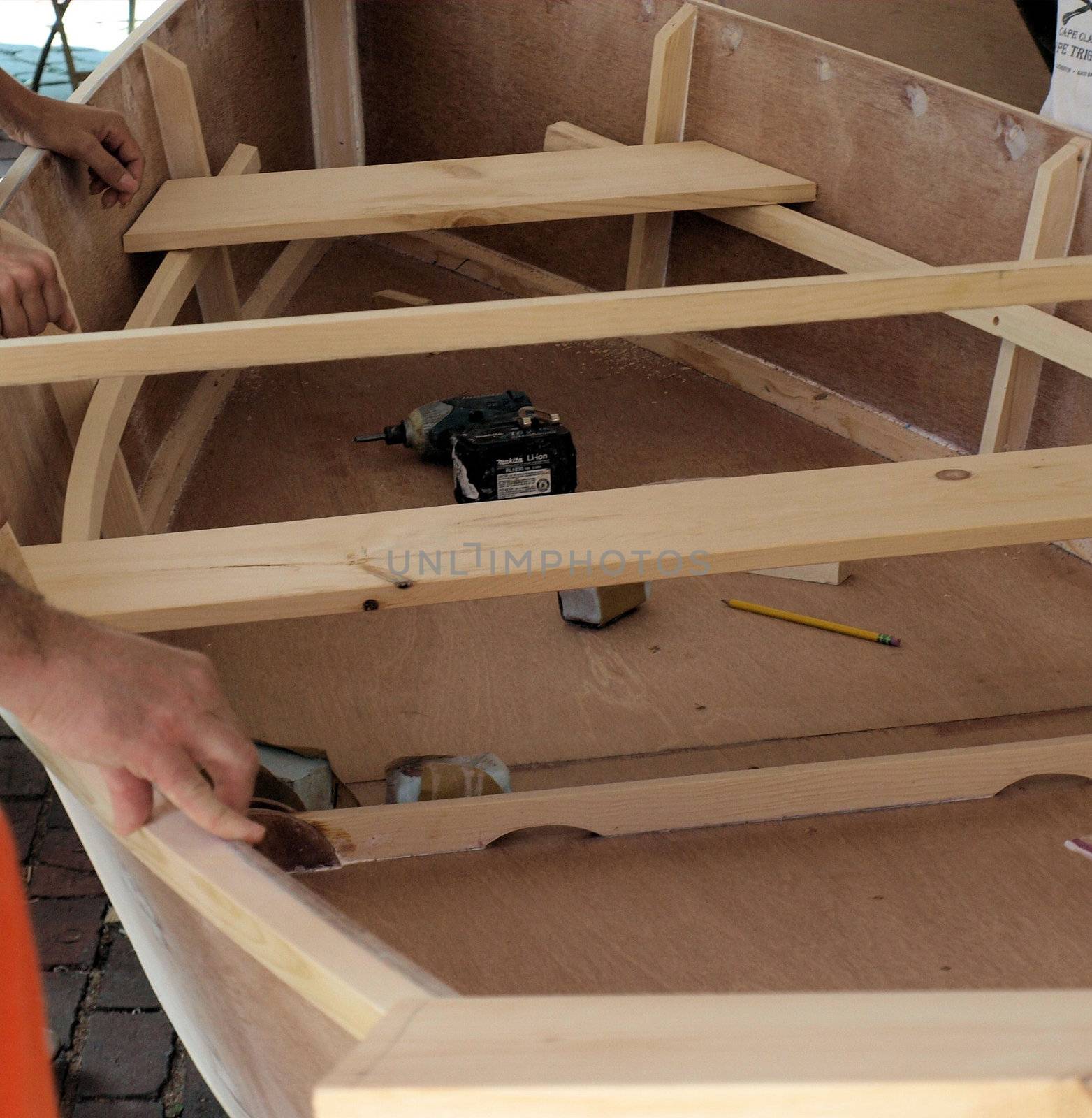 A person working on a hand made boat