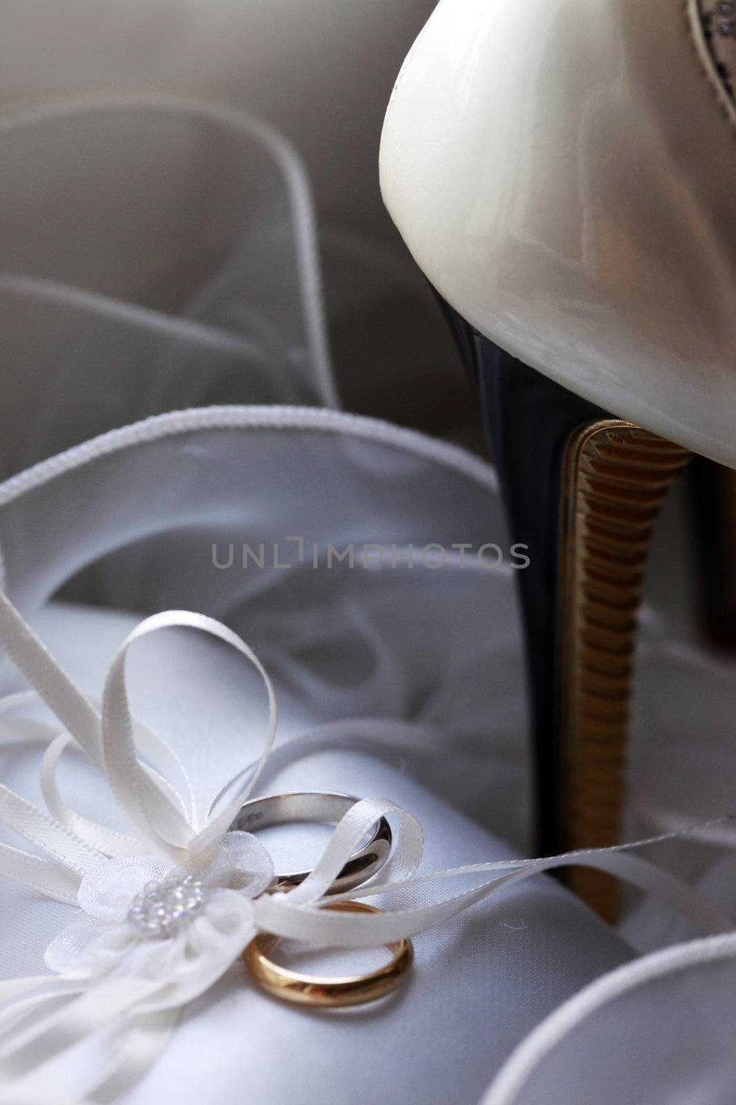 Wedding rings on a satiny fabric