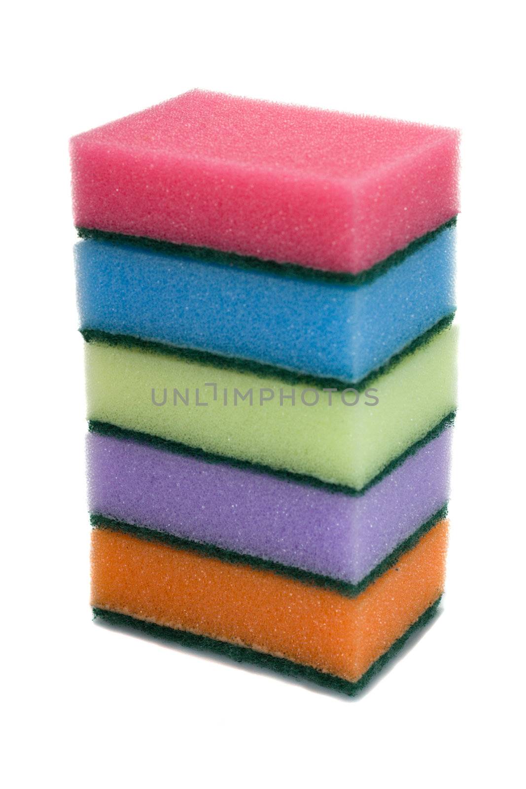five colored sponges, isolated on white