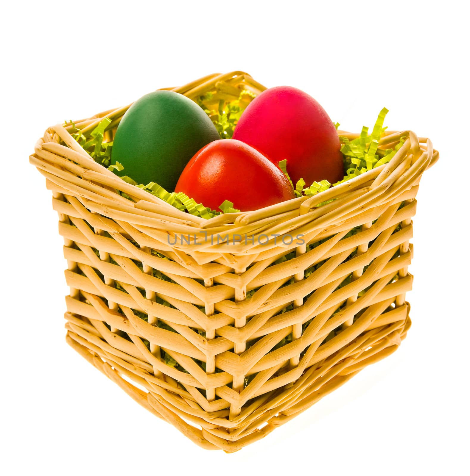 Multi-coloured eggs in a basket by Gravicapa