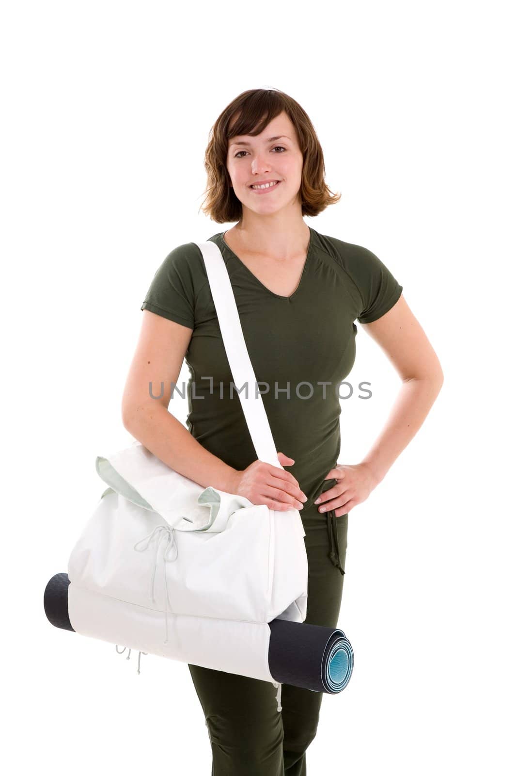 Pretty brunette ready to go to the gym with her sports bag