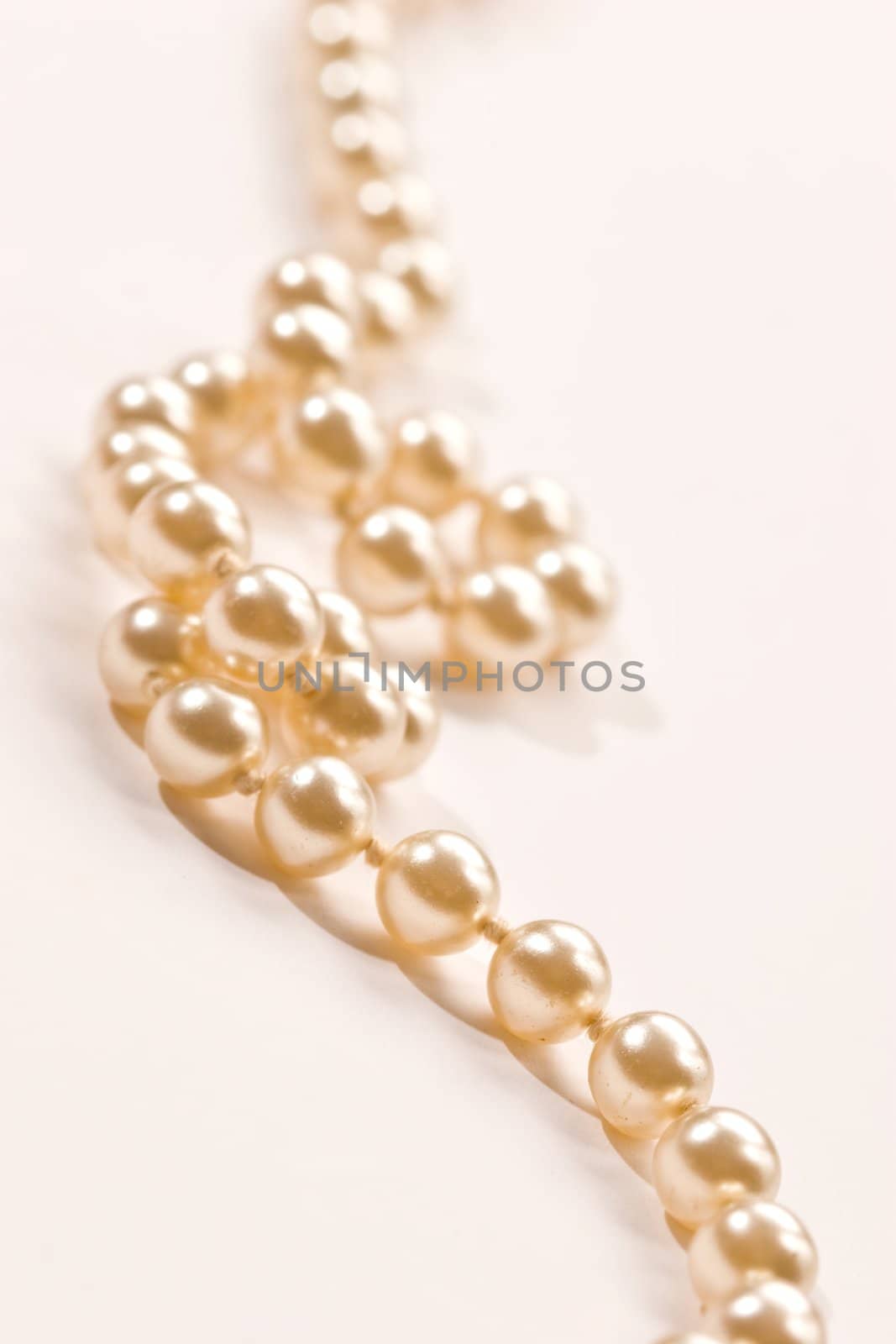 White beads on a white background, Venetian pearl