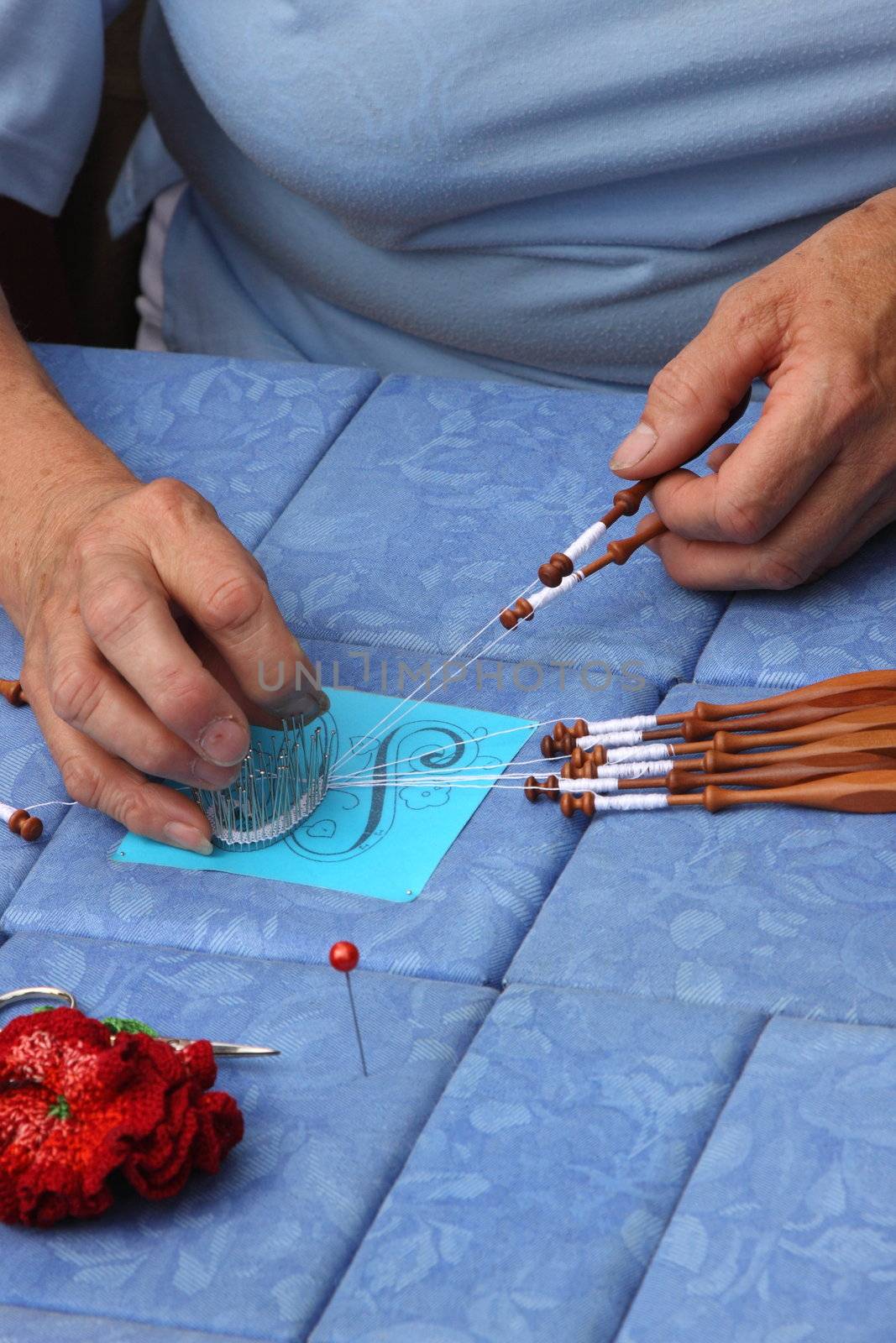 Process of lace-making with bobbins  by jp_chretien